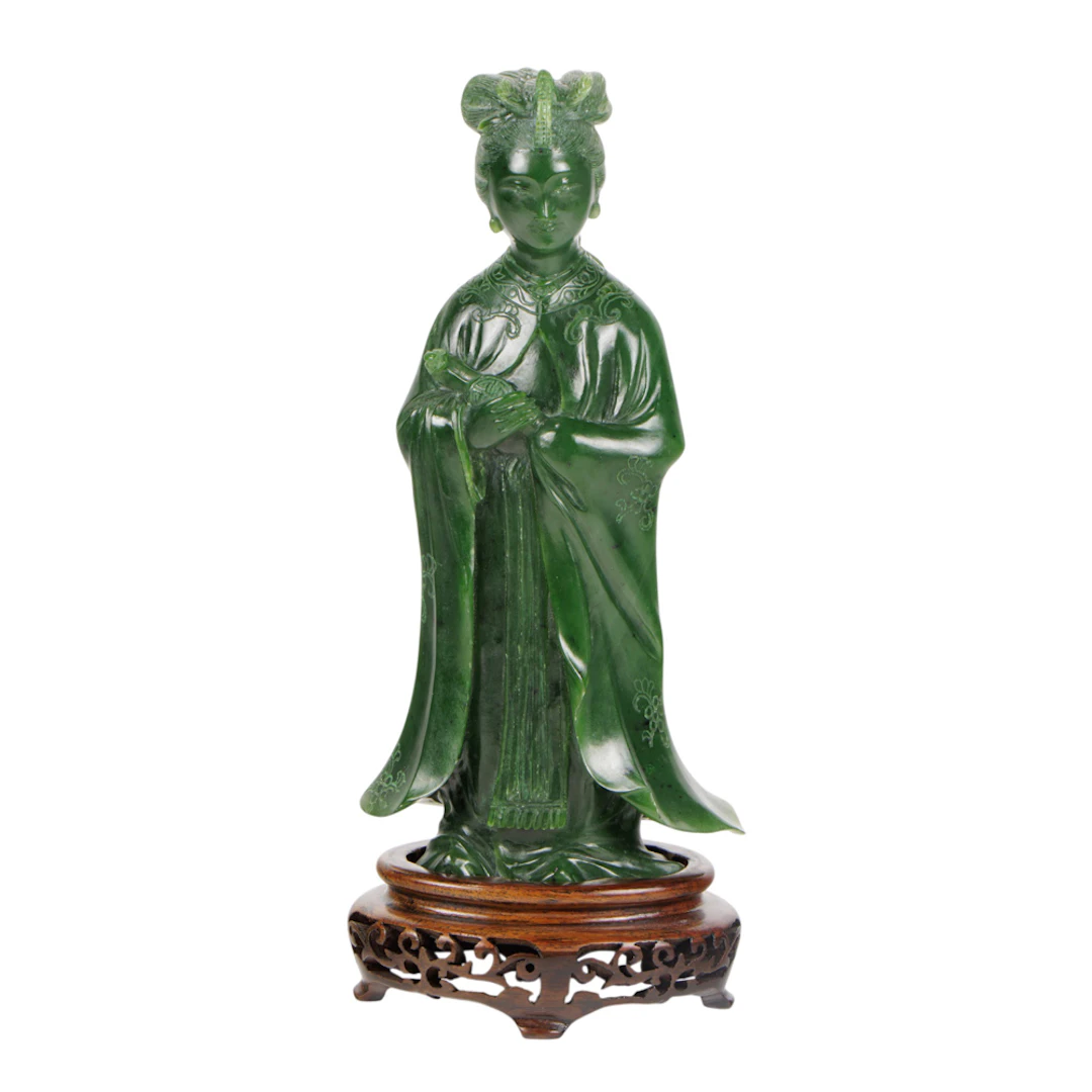 A Chinese spinach jade celestial maiden figure