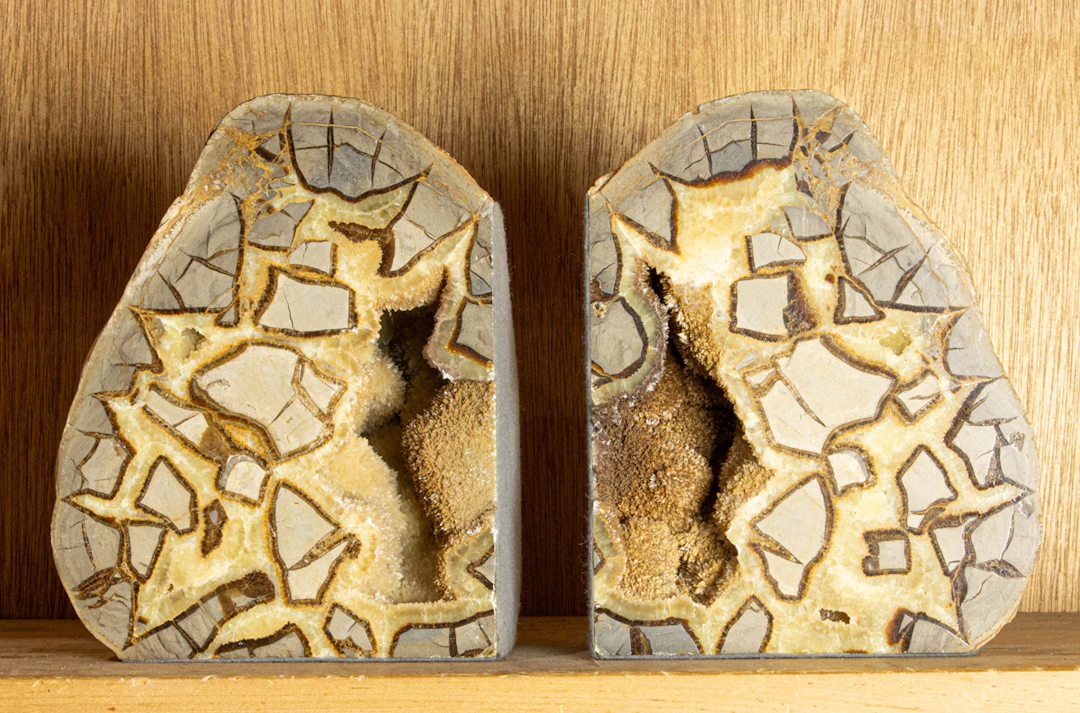 A pair of polished septarian geode bookends