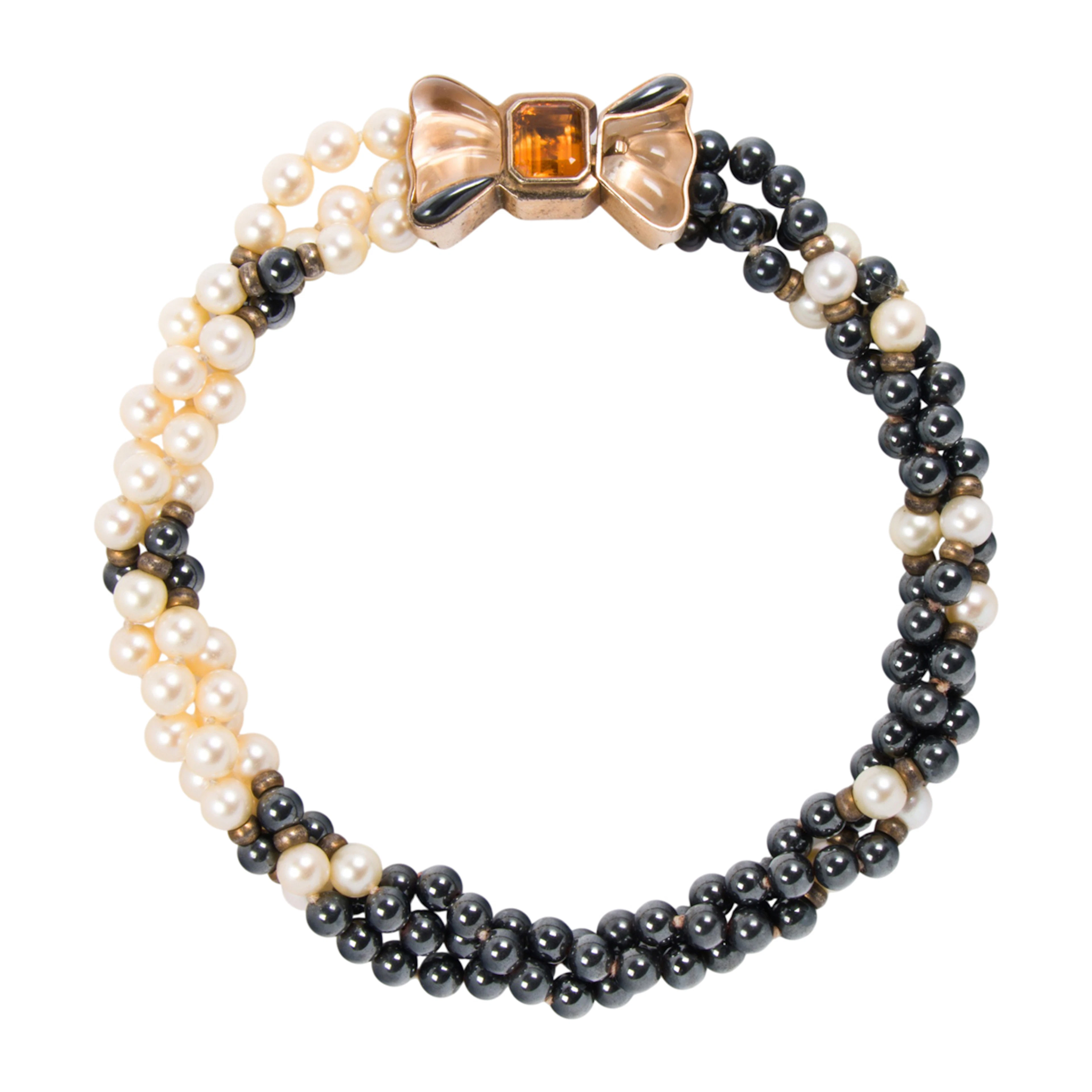 A cultured pearl, hematite, hardstone, and silver necklace