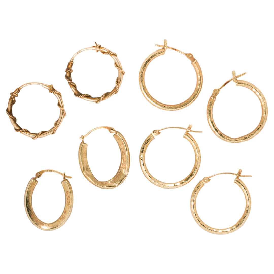 Four pairs of 14k gold hoop earrings
