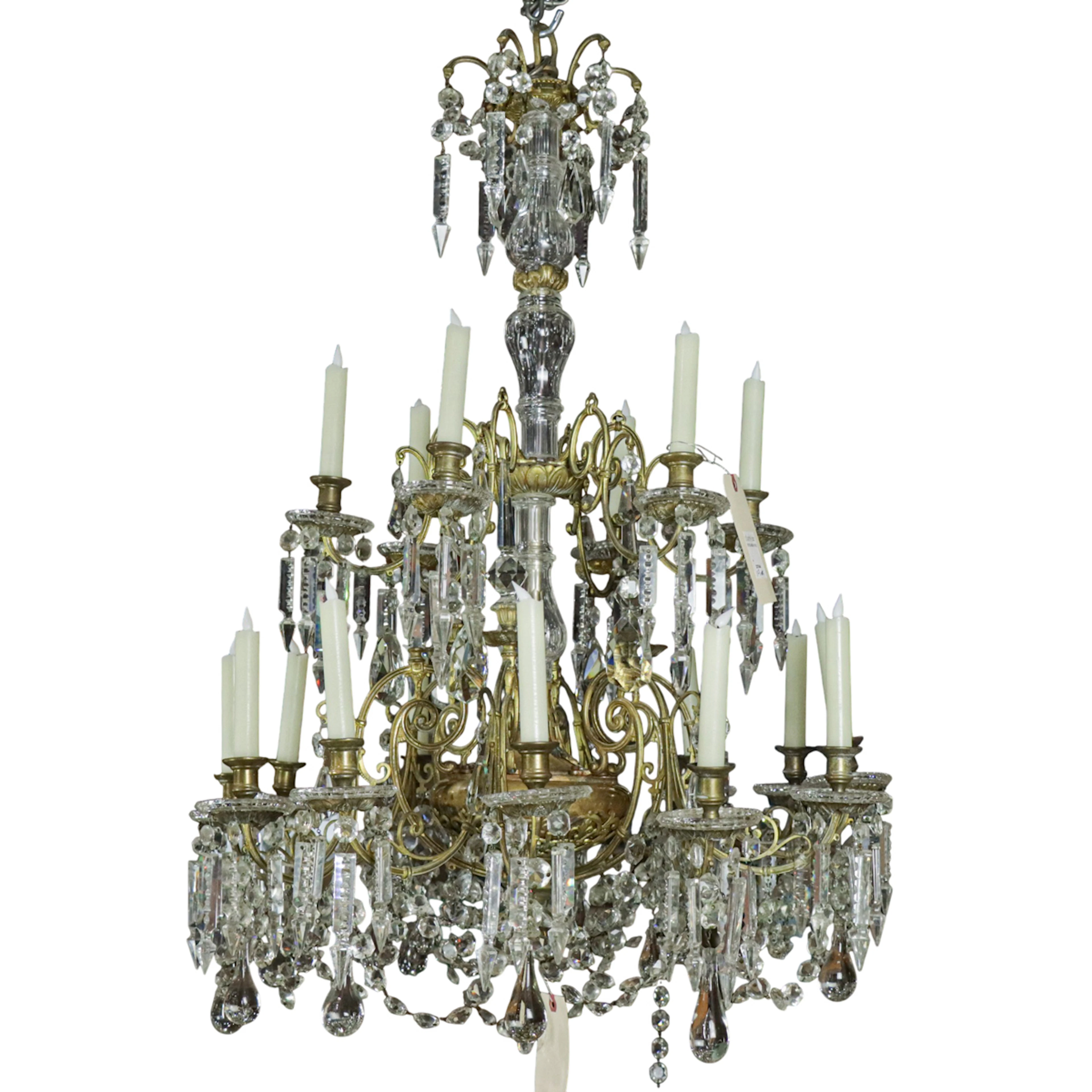 A Neoclassical style gilt bronze and cut glass eighteen light chandelier