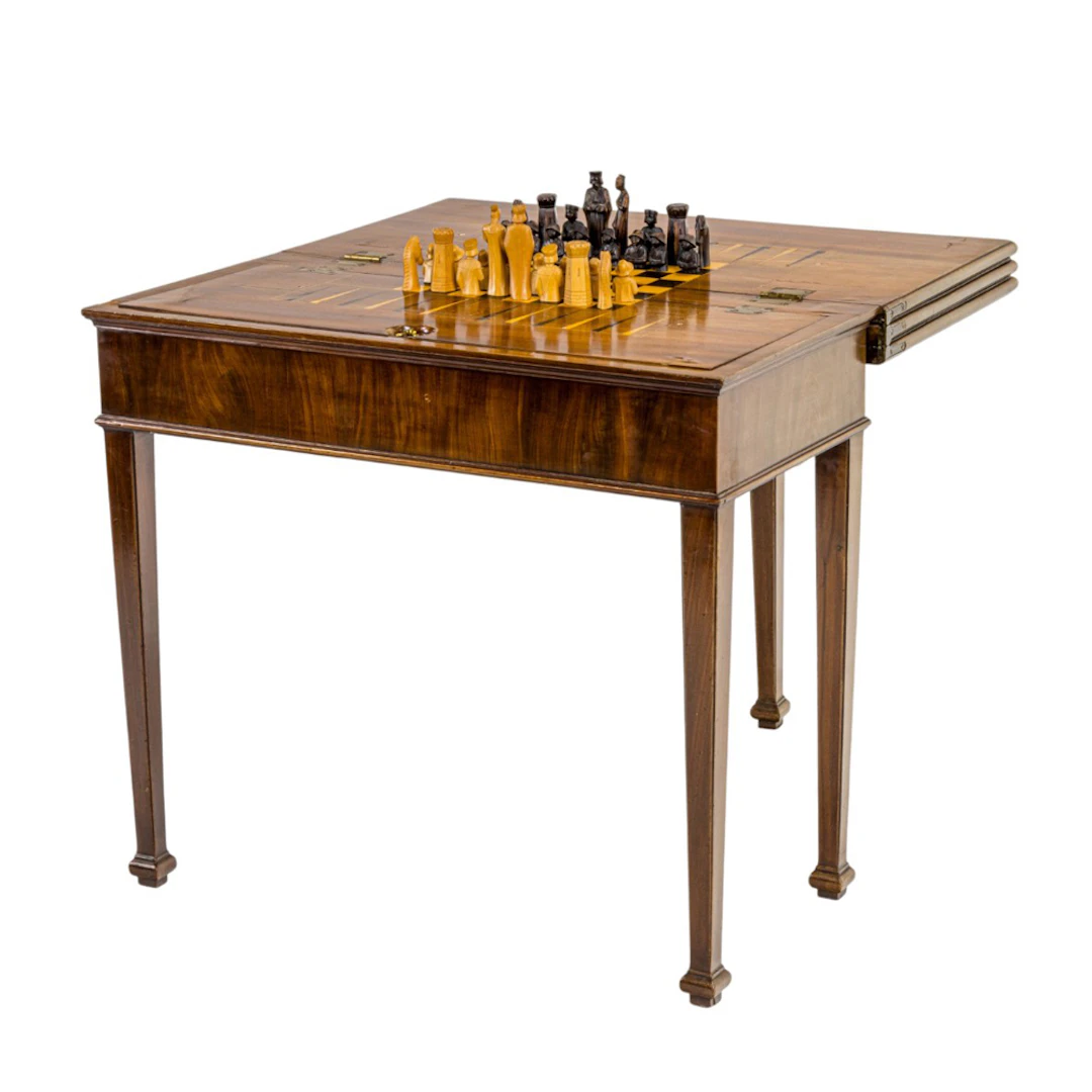 An English mahogany flip top games table 19th century