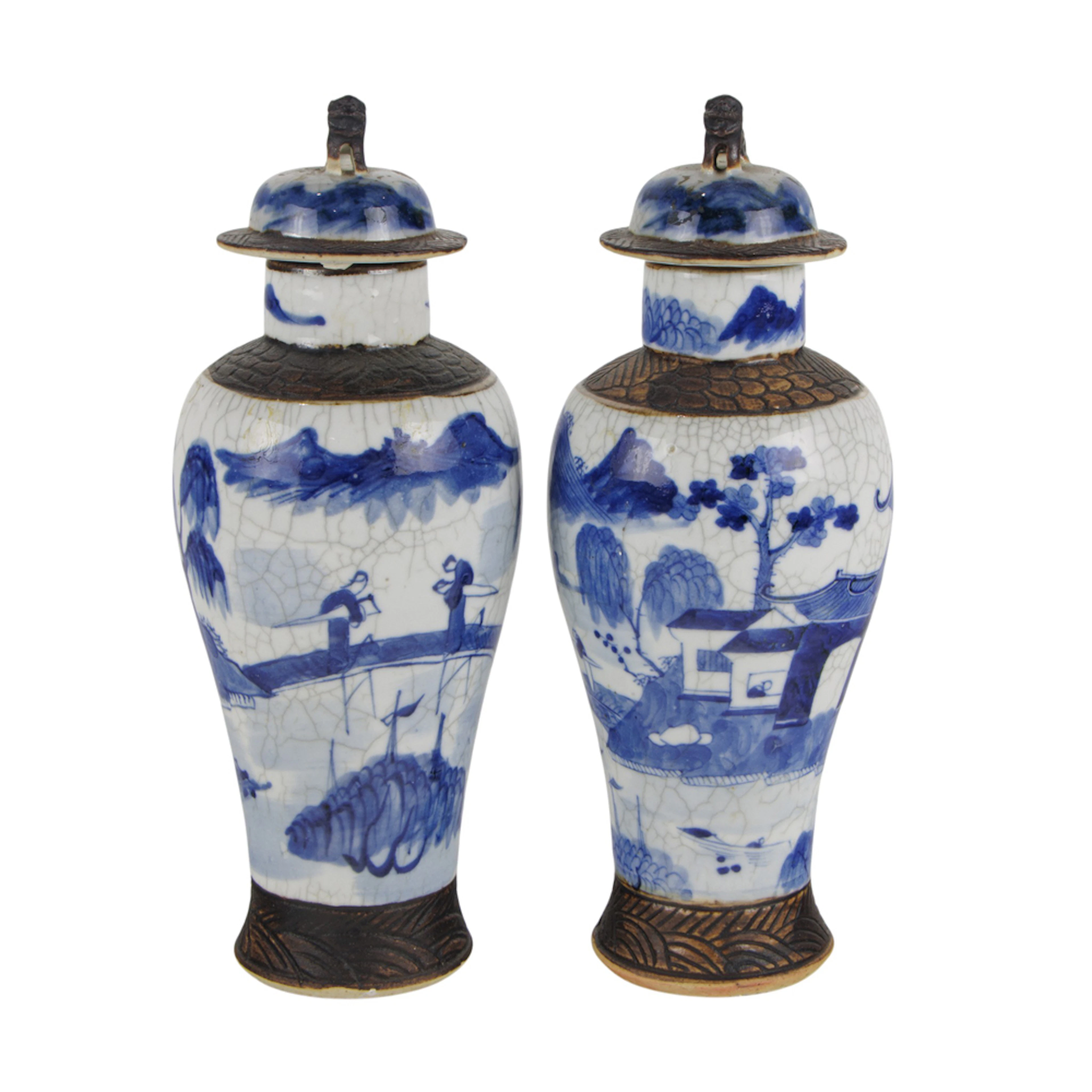 A pair of Chinese blue and white covered vases