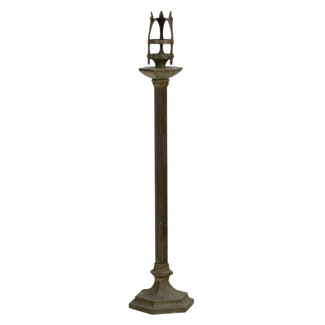 A Gothic Revival style bronze candle stand or torchiere