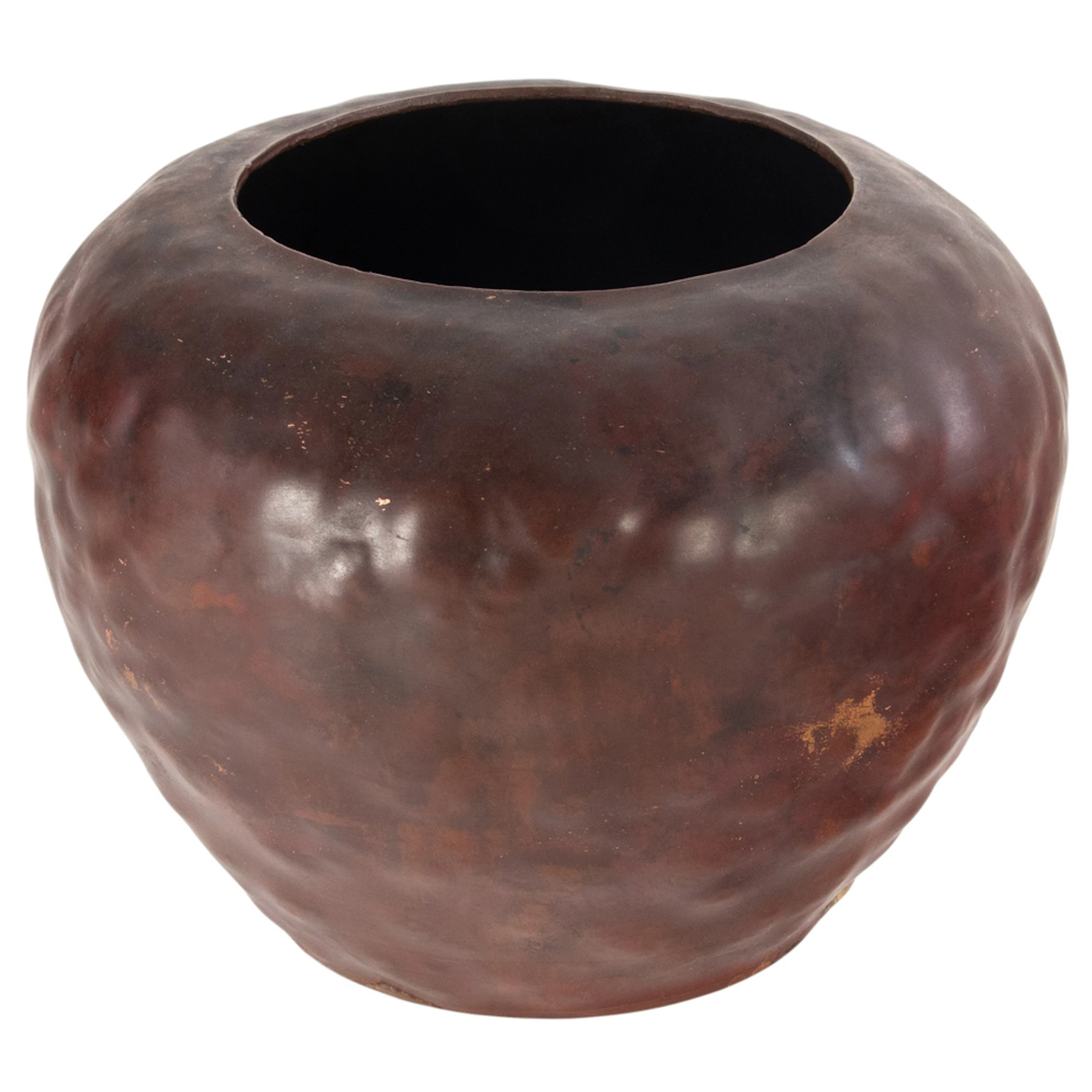 A Michael Adams hammered copper warty vase
