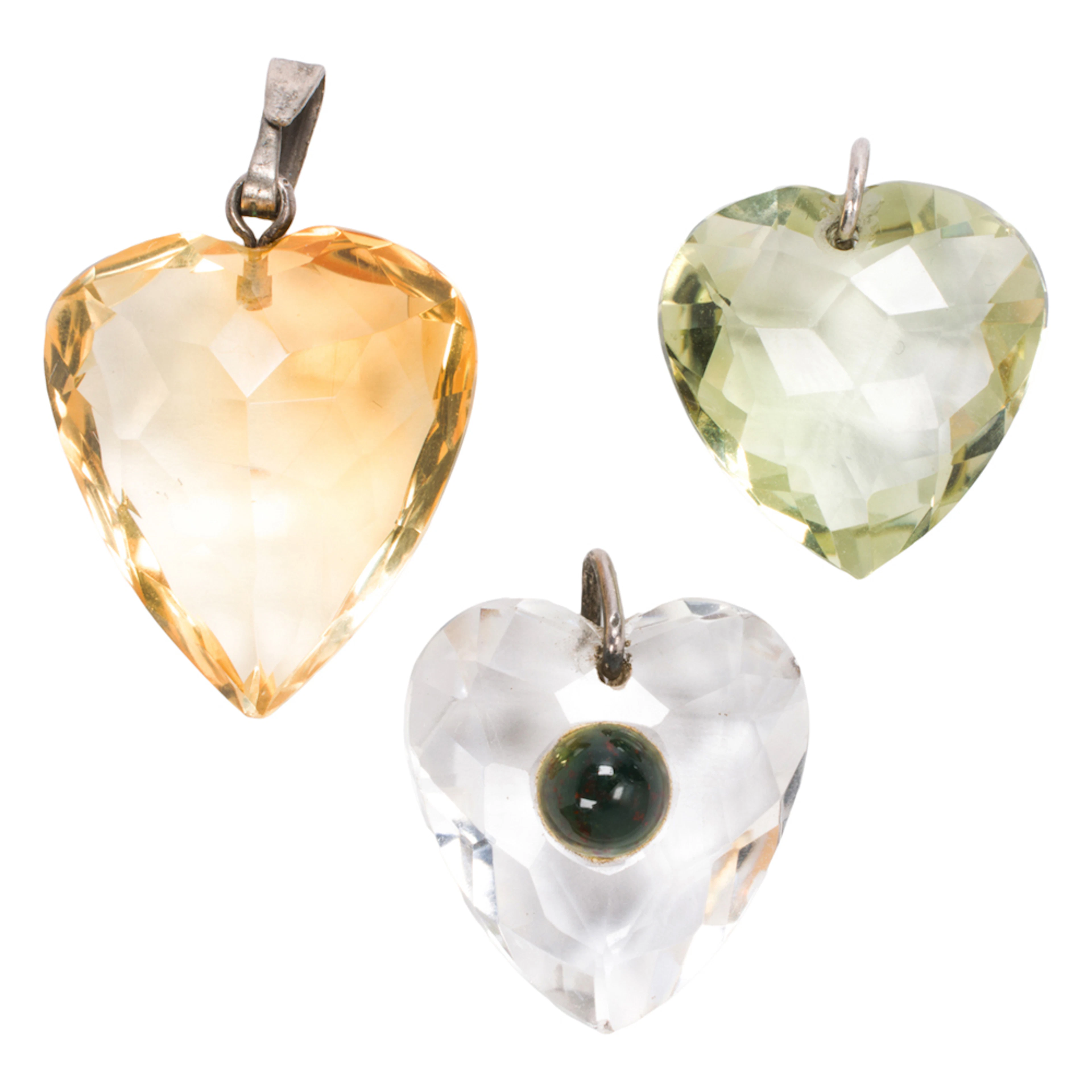Three hardstone heart pendants