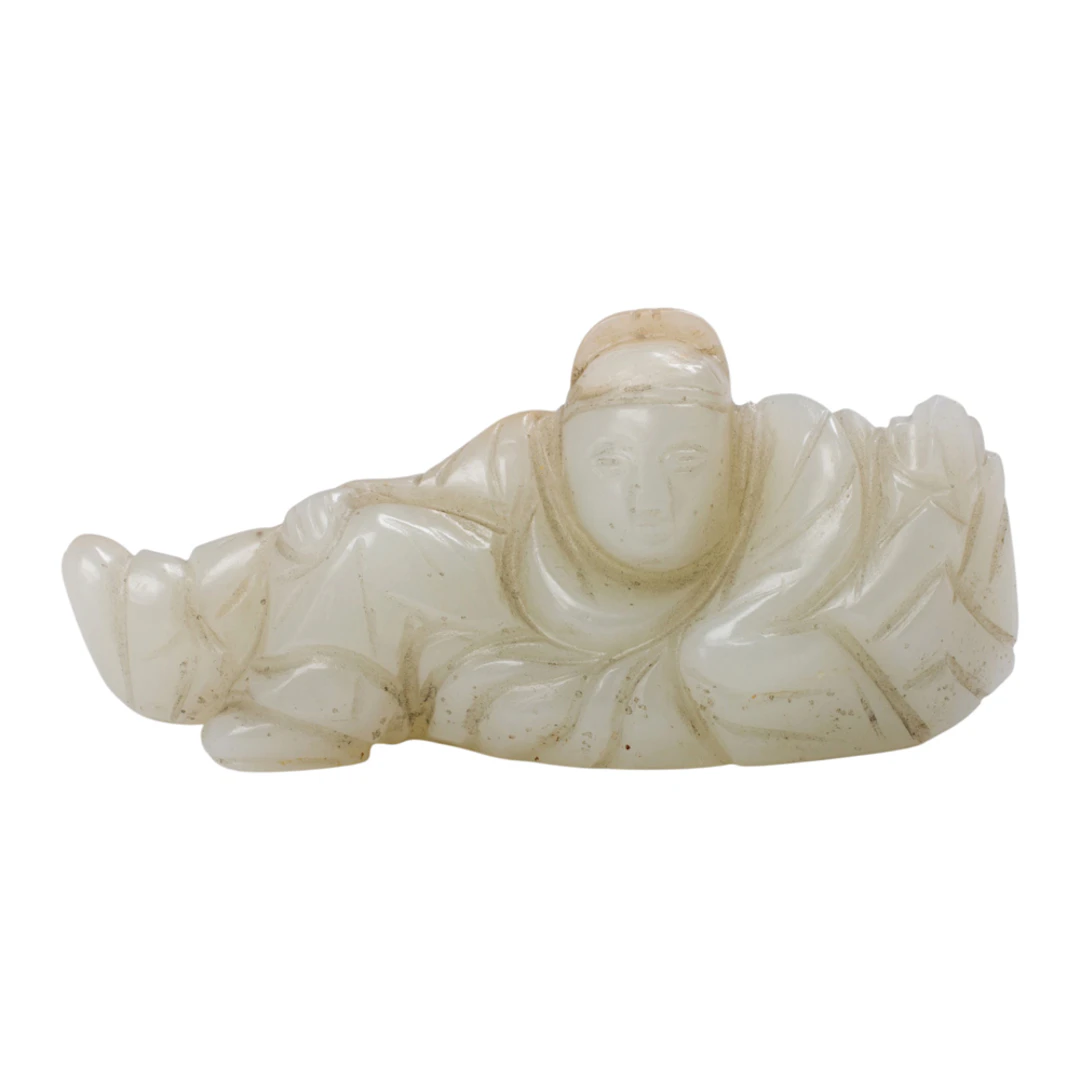 A Chinese white jade brush rest