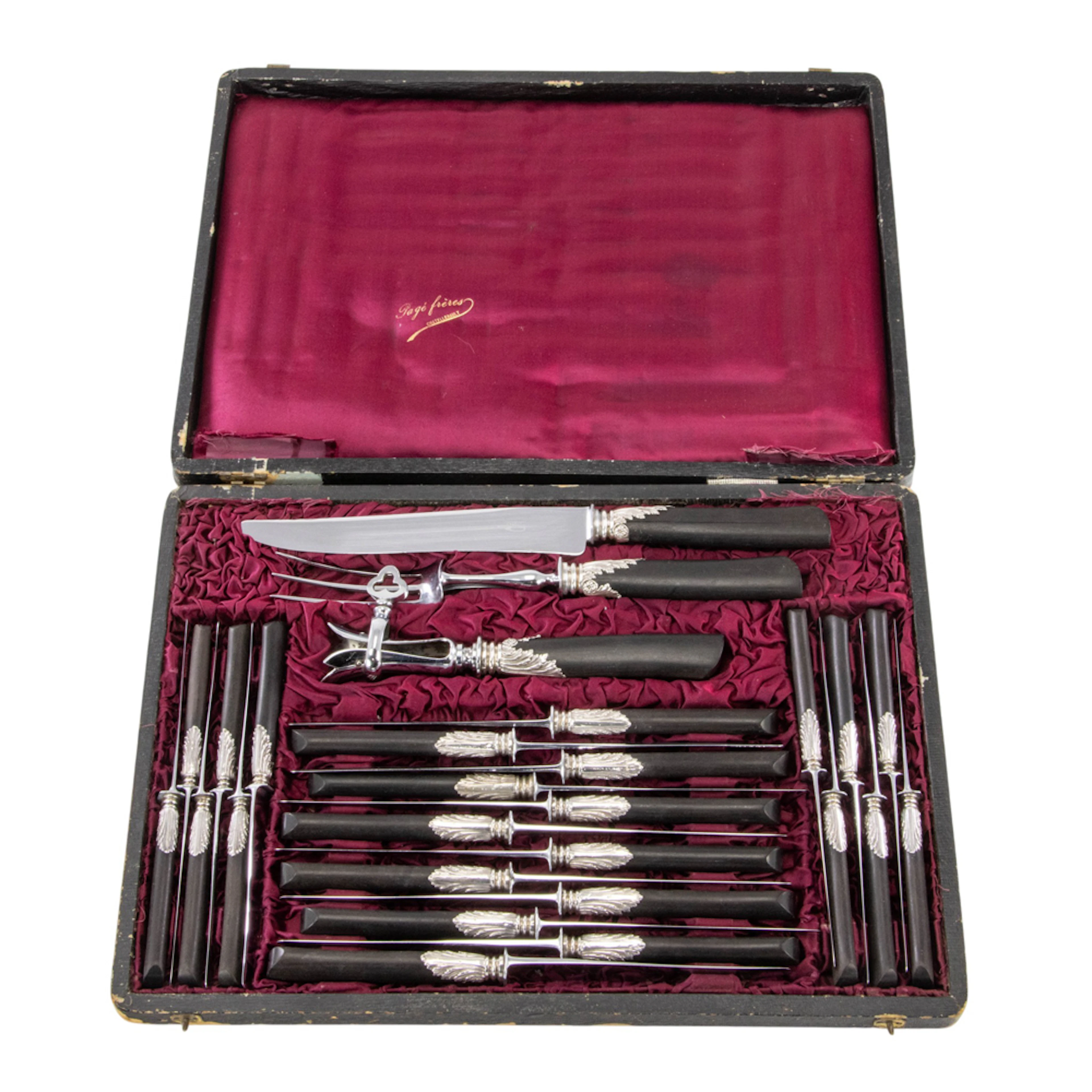 An antique Chattelerault 3-piece carving set with 24 knives