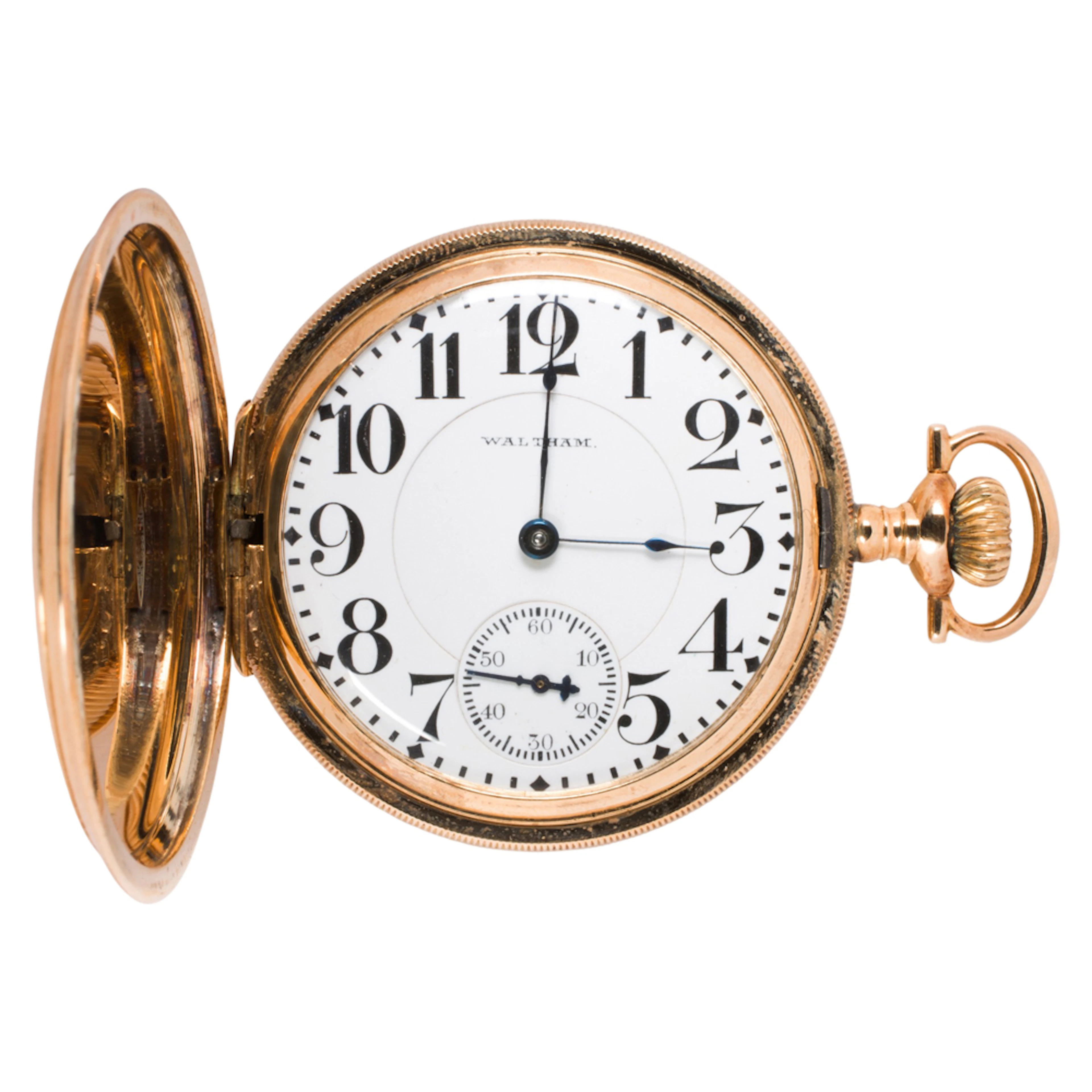 A Waltham 14k gold pocket watch