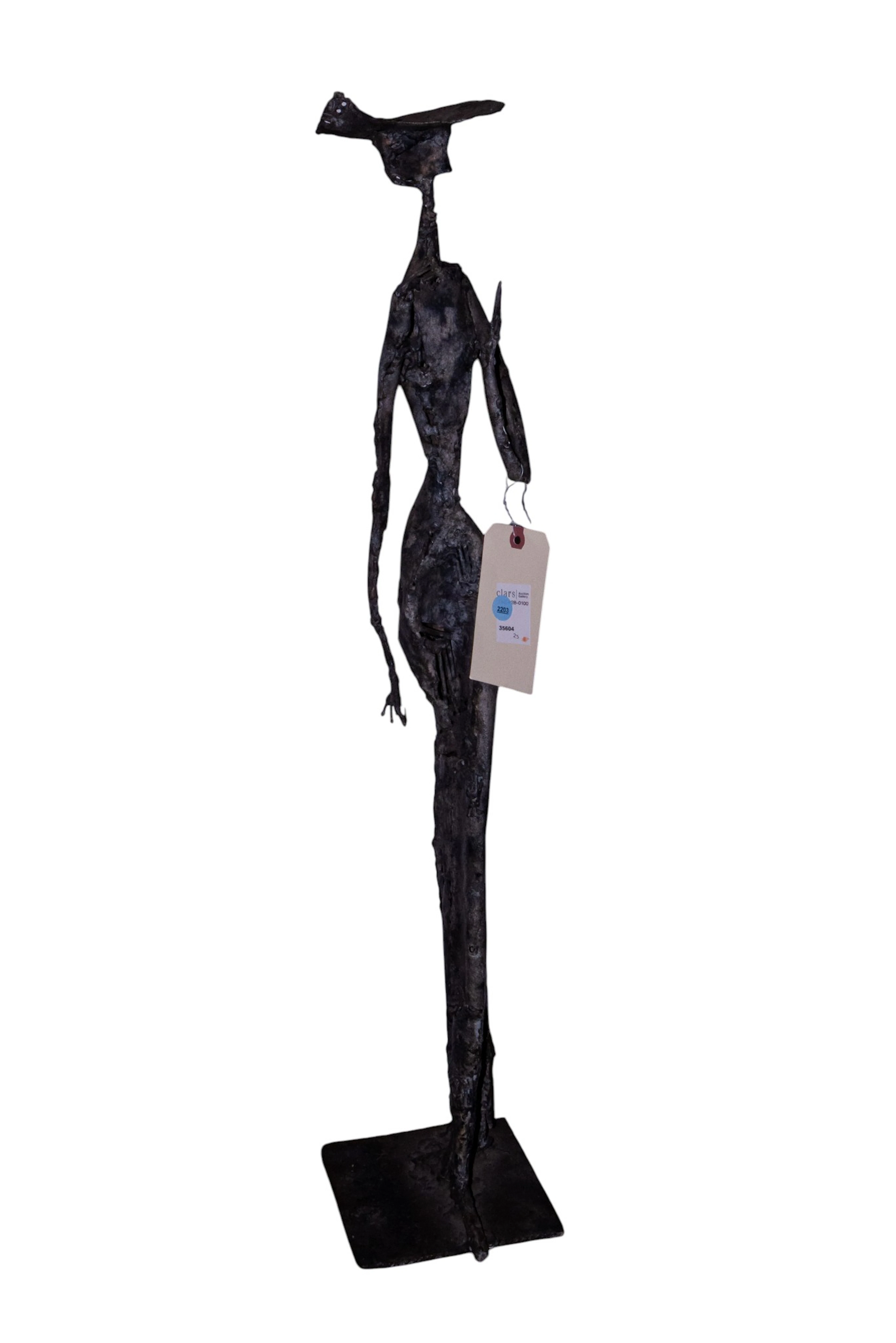 A Brutalist style welded metal figure