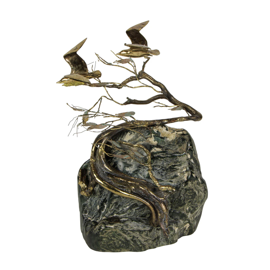 A Brutalist welded metal and stone group