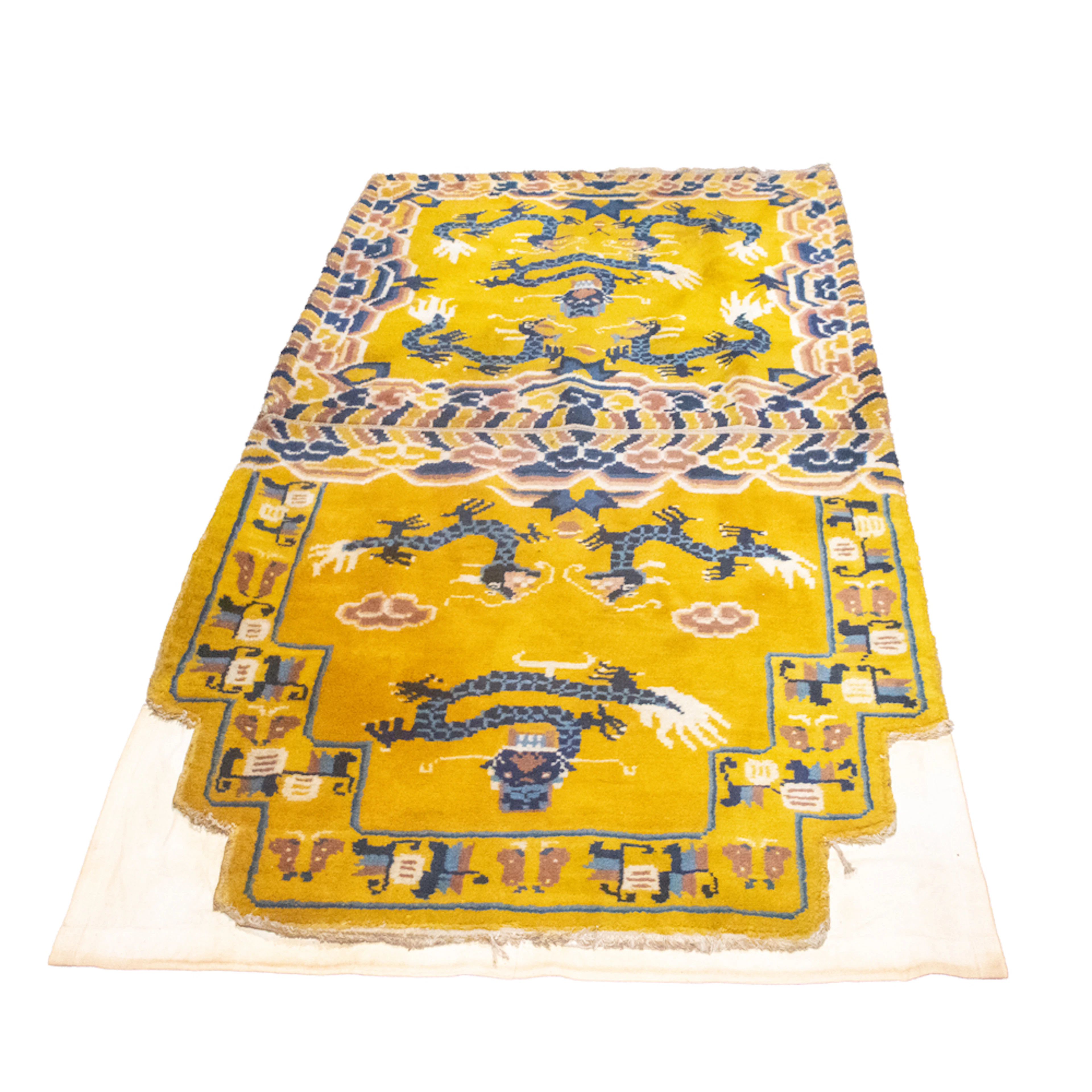 An antique Sino Tibetan throne carpet