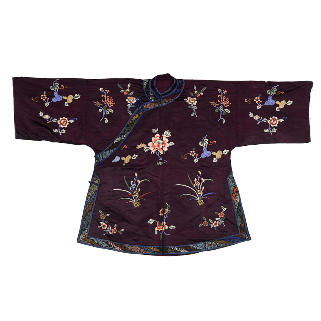A Chinese embroidered lady's purple ground jacket