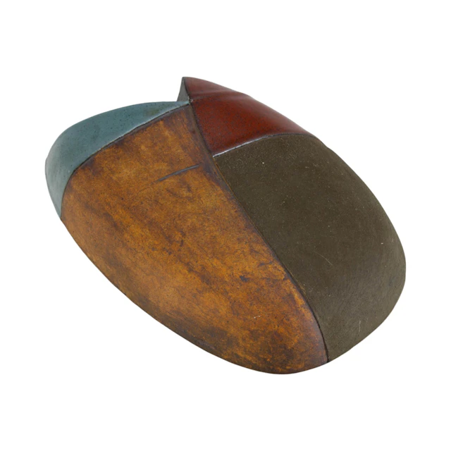 A contemporary partial glazed stoneware sculpture