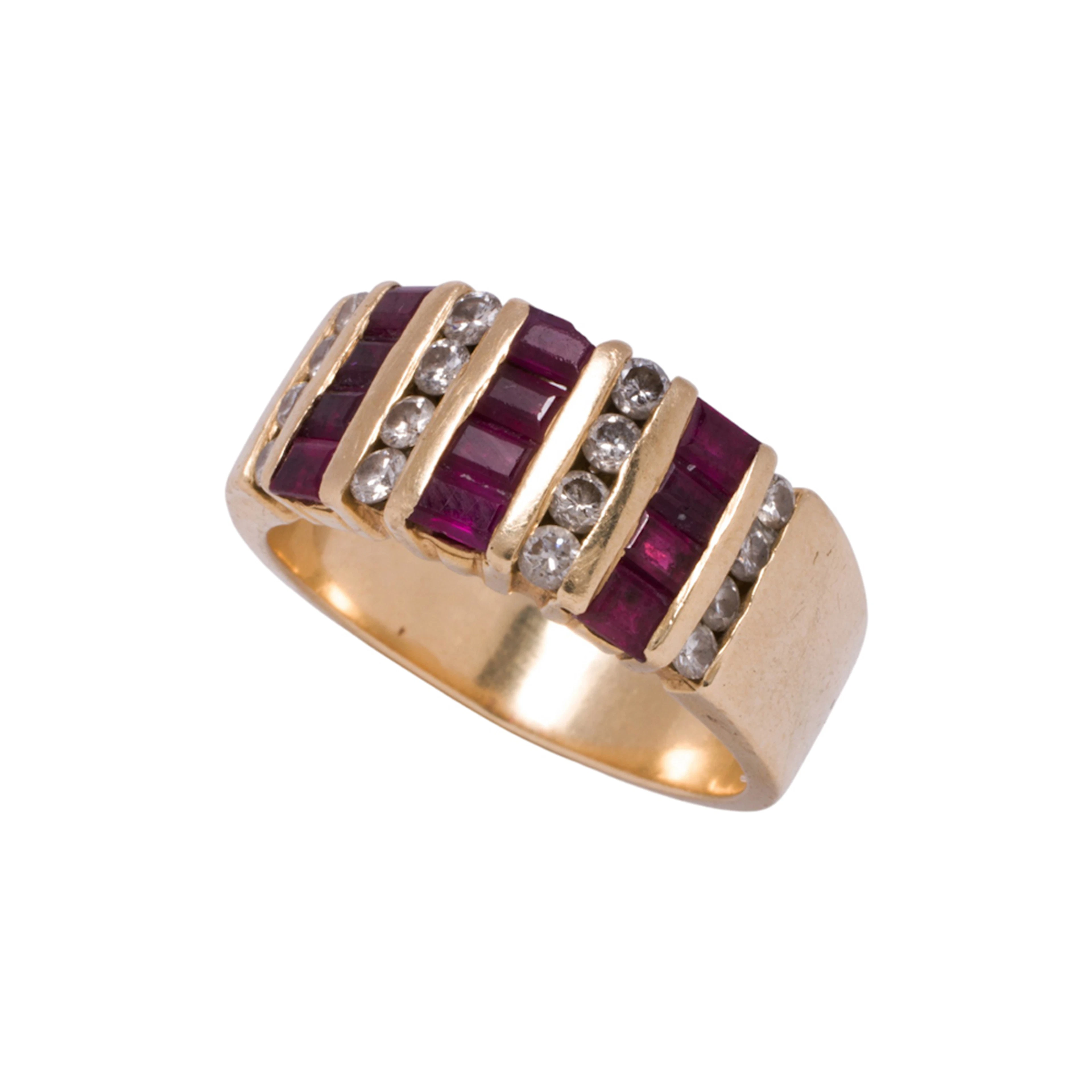A ruby, diamond, and 14k gold ring