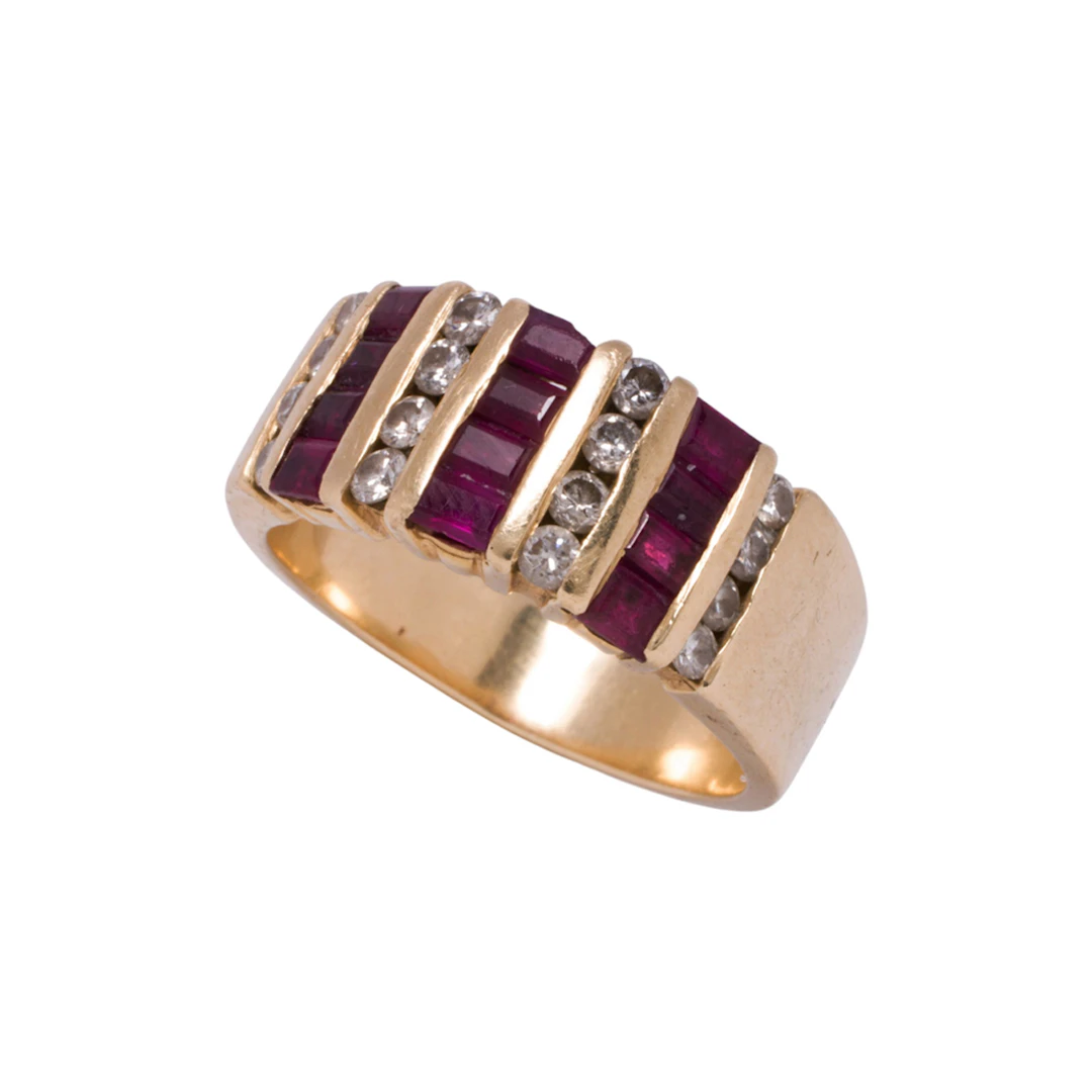 A ruby, diamond, and 14k gold ring