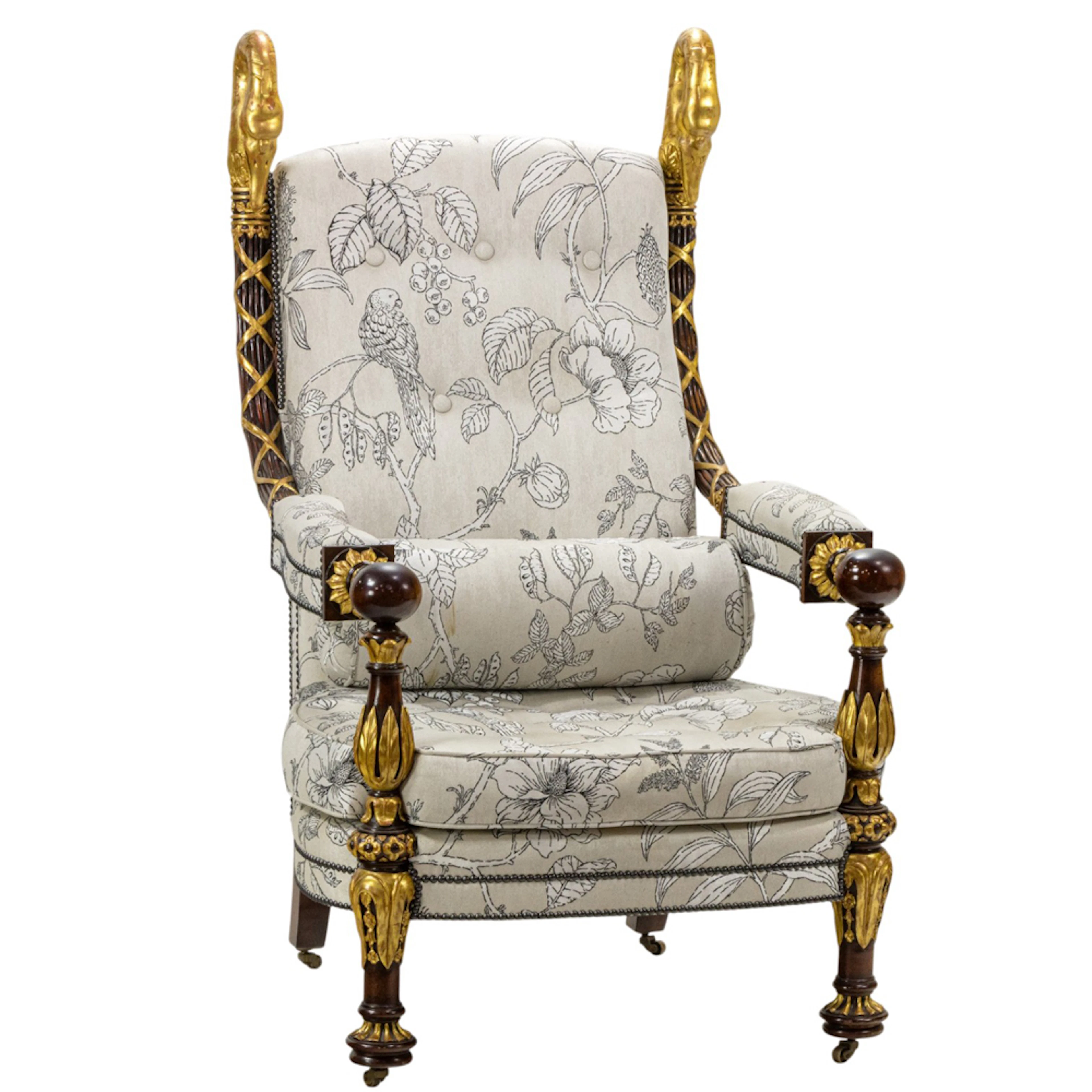 A large custom upholstered parcel gilt armchair in the Empire taste