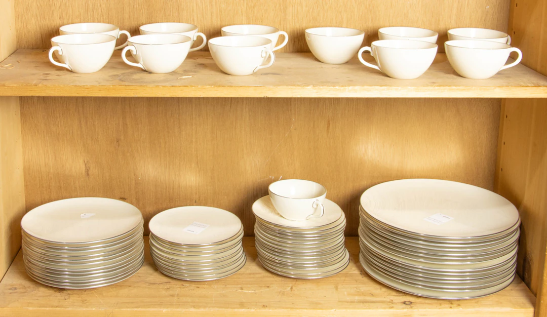 A Lenox porcelain dinner service in the Olympia Platinum pattern