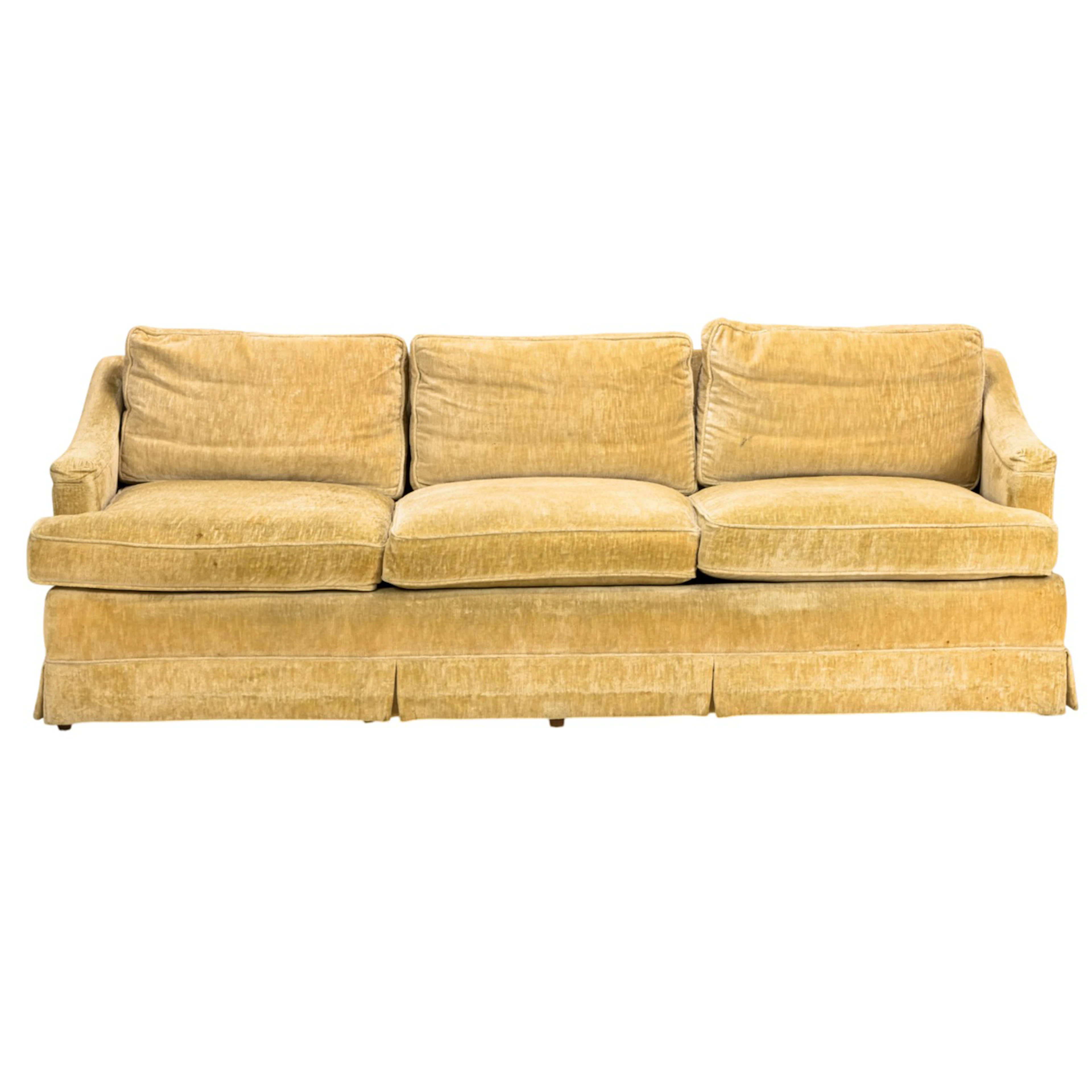 A vintage Henredon feather filled sofa upholstered in cream chenille