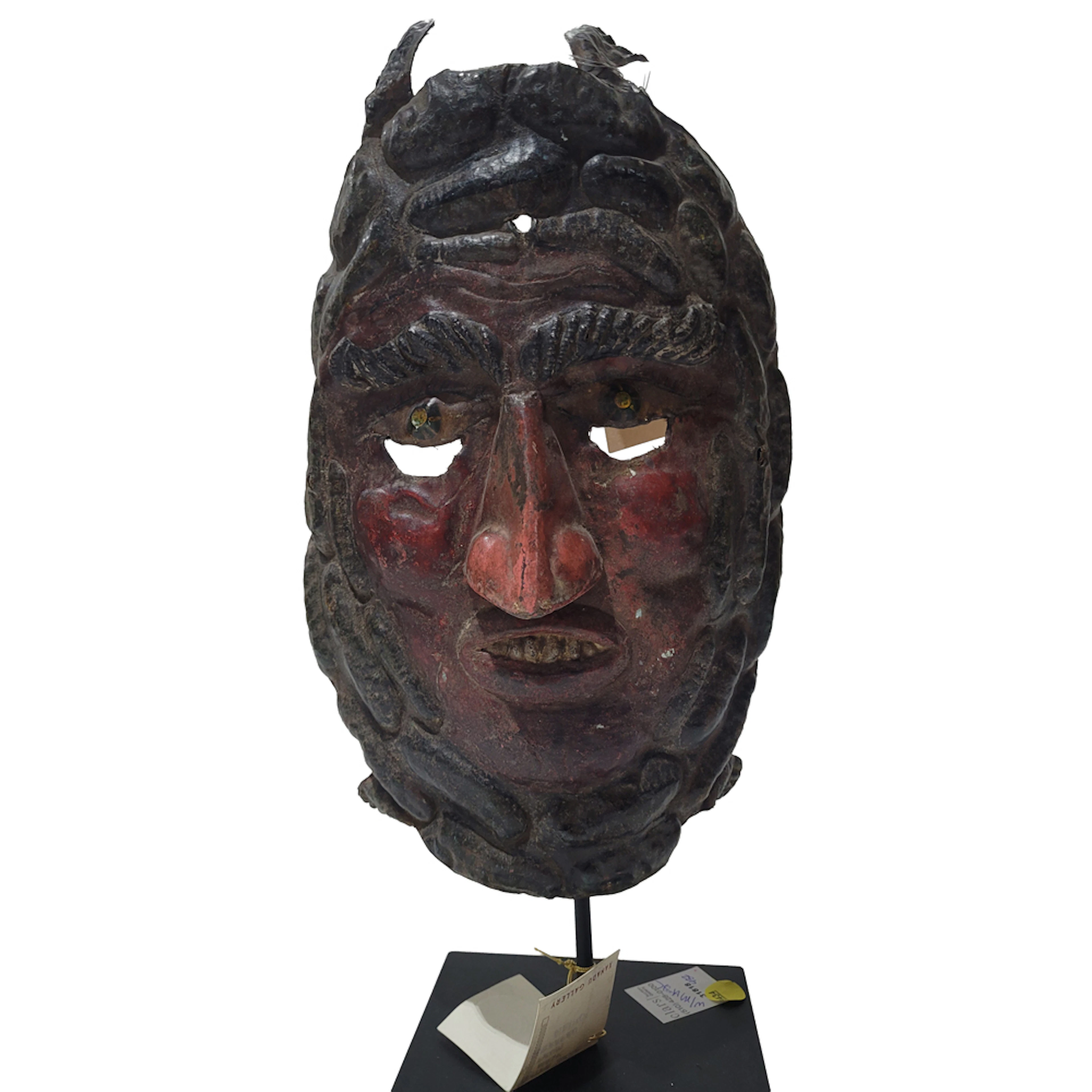 A Mexican painted metal turtle mask