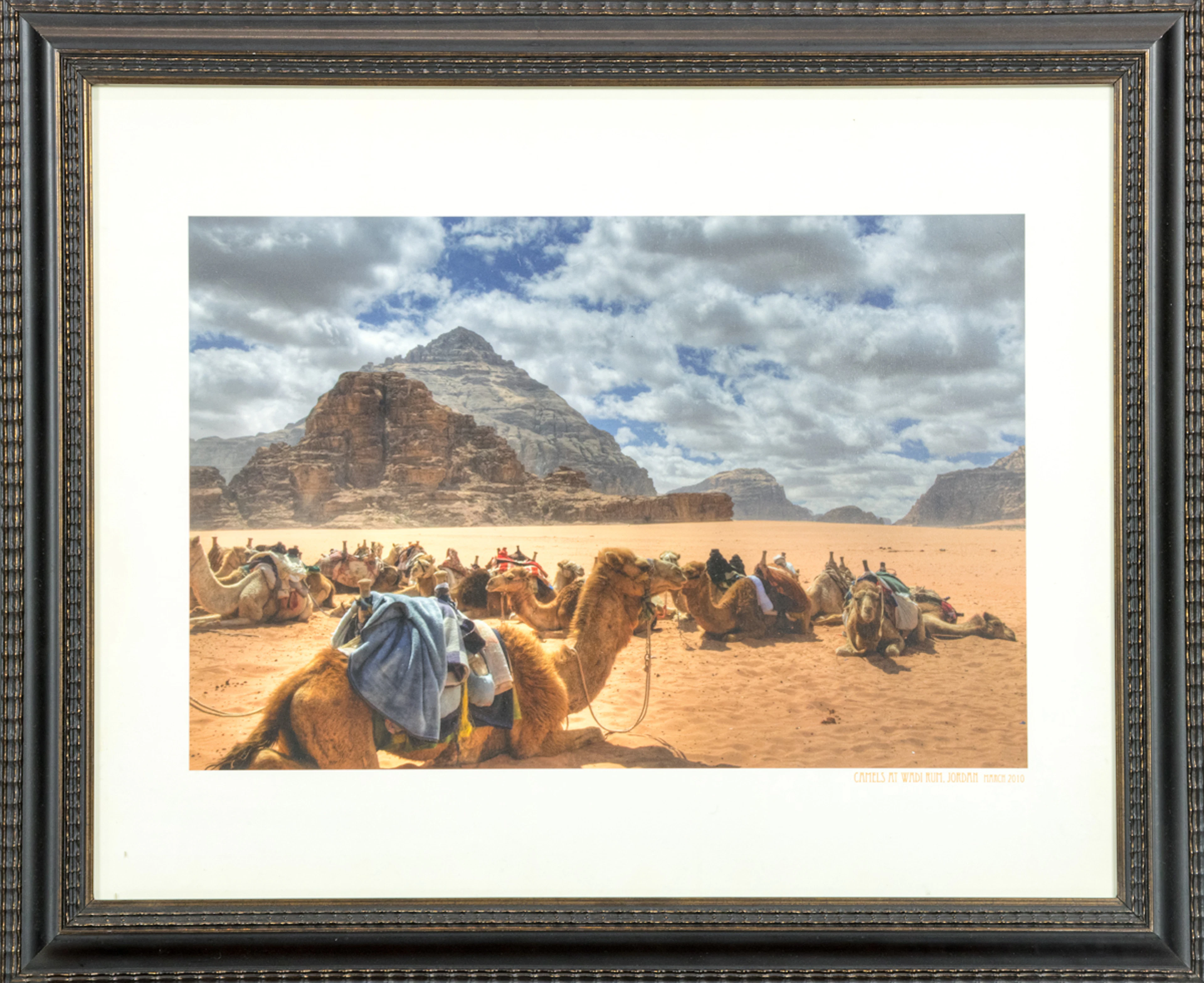 Three framed pictures