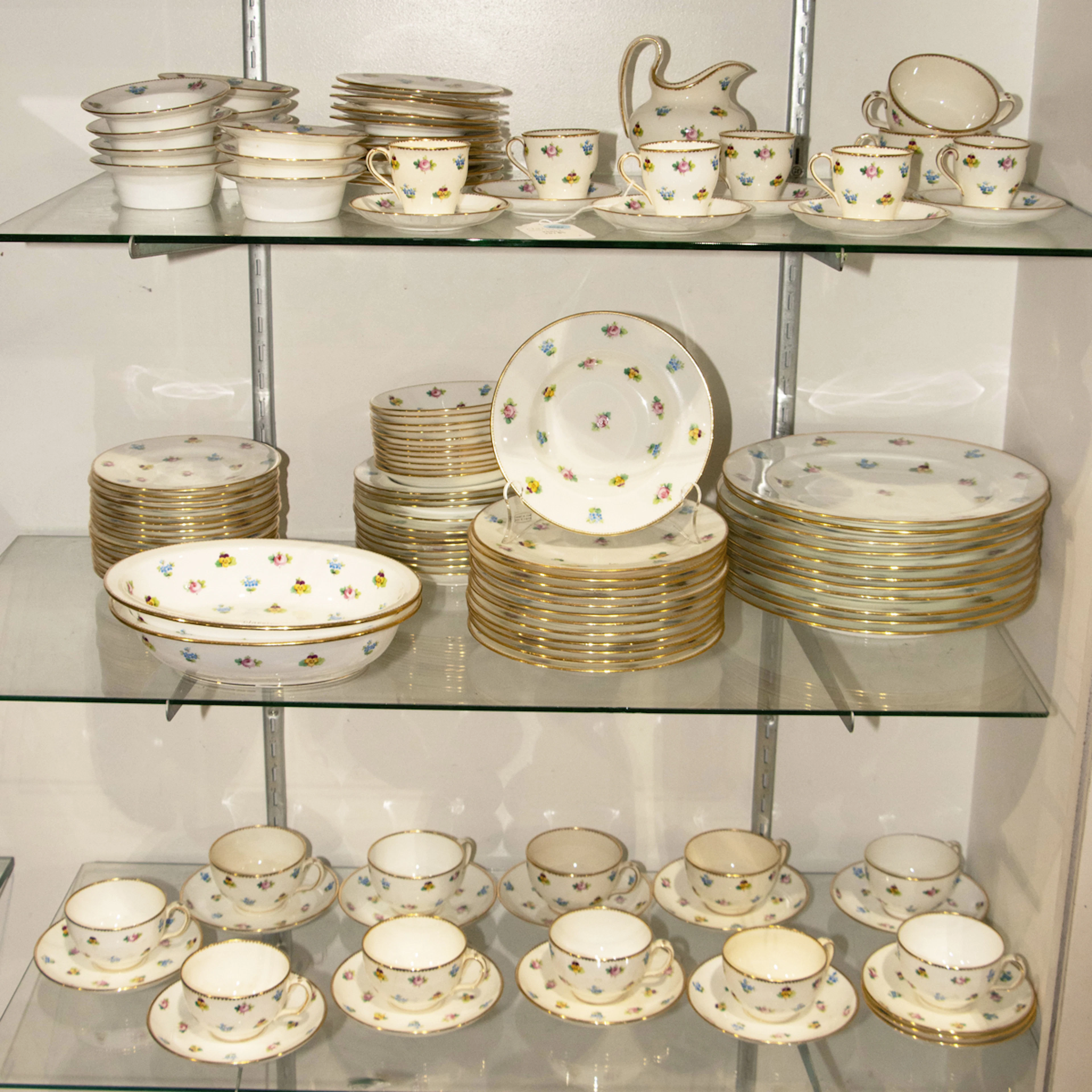 A Minton porcelain dinner service