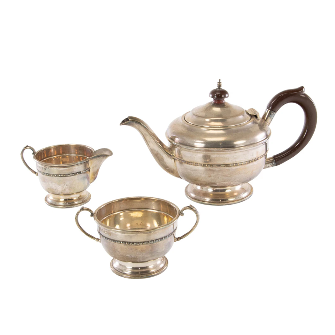 A George V silver three piece small tea set, S & Co