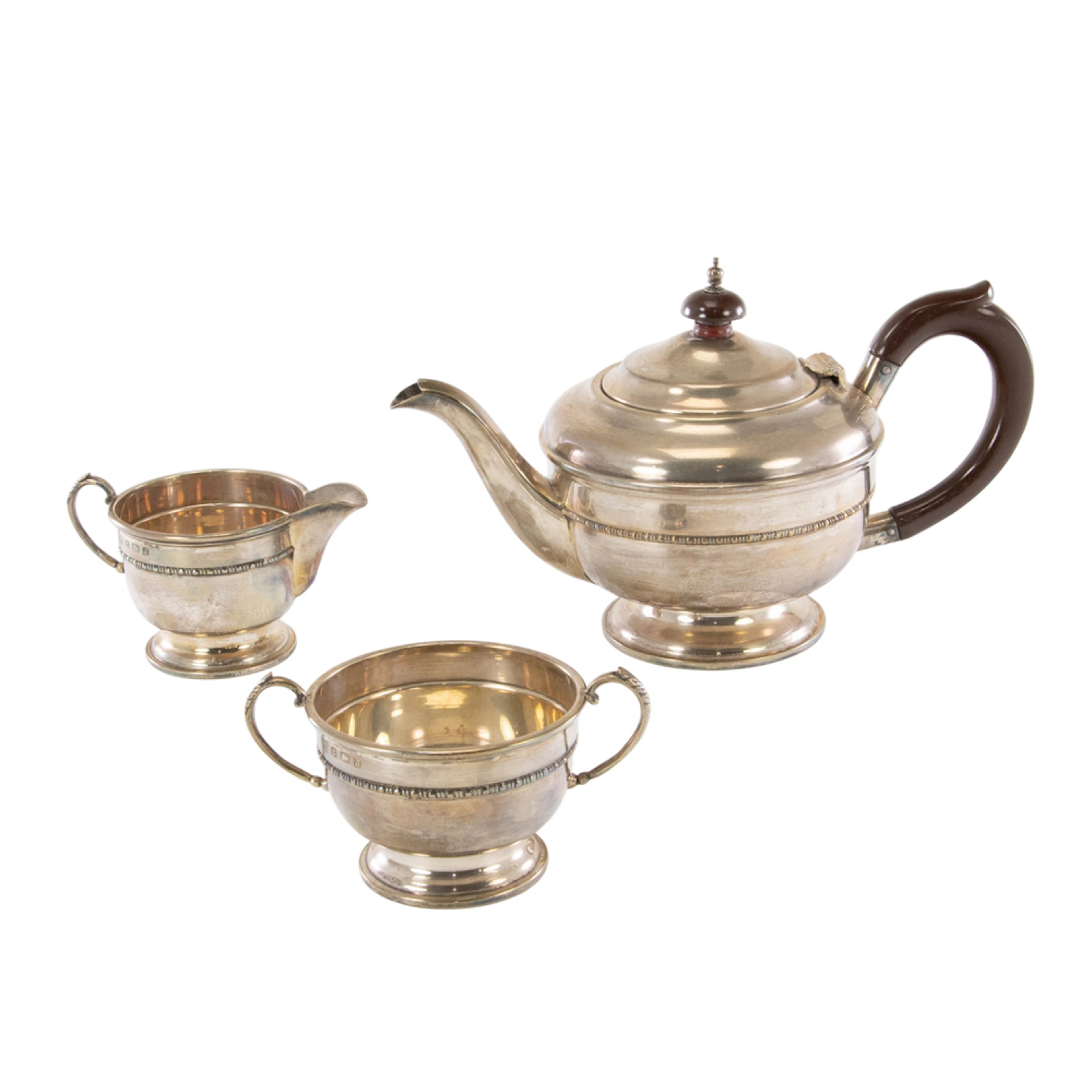 A George V silver three piece small tea set, S & Co