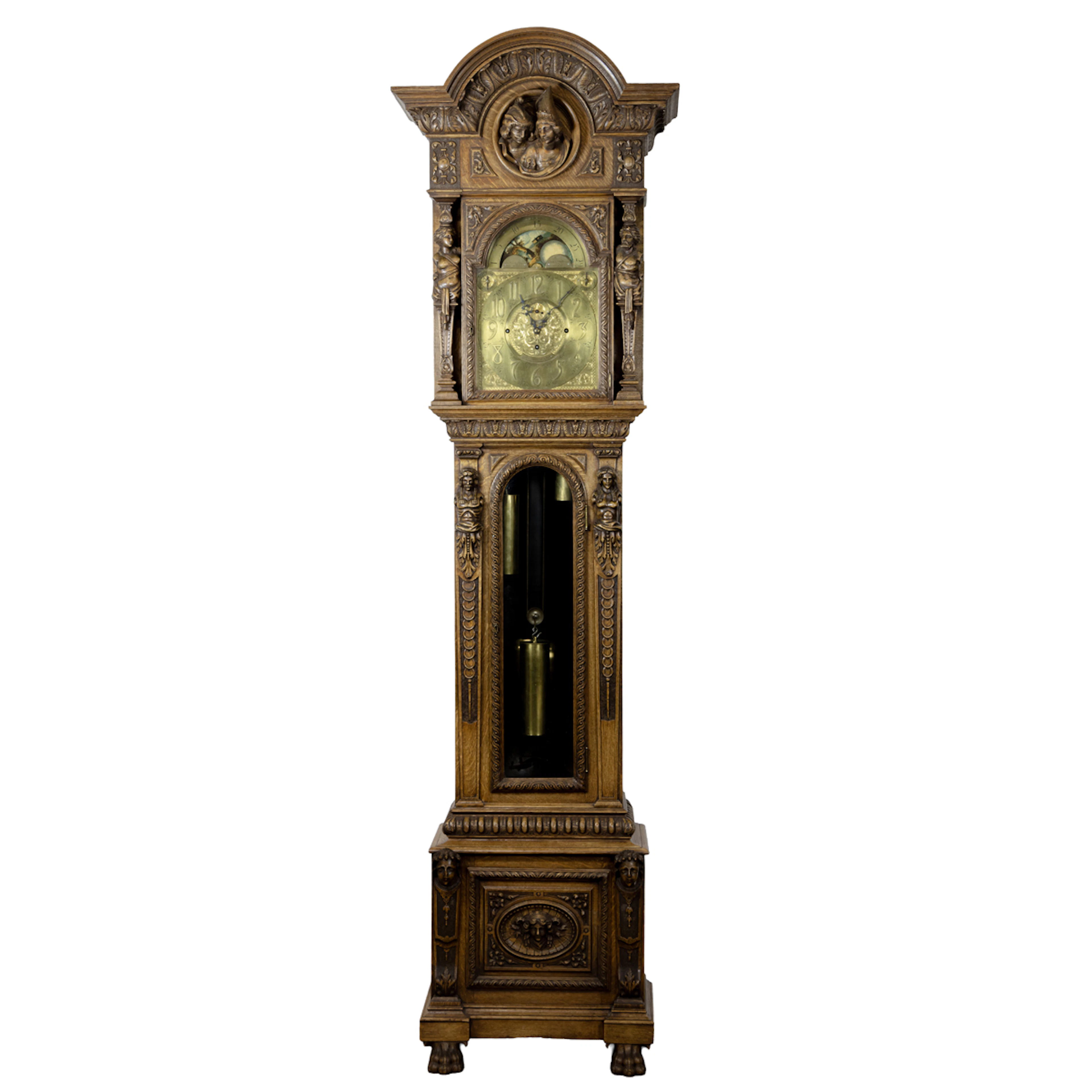 A monumental J.C Jennens English oak moon phase tall case clock in