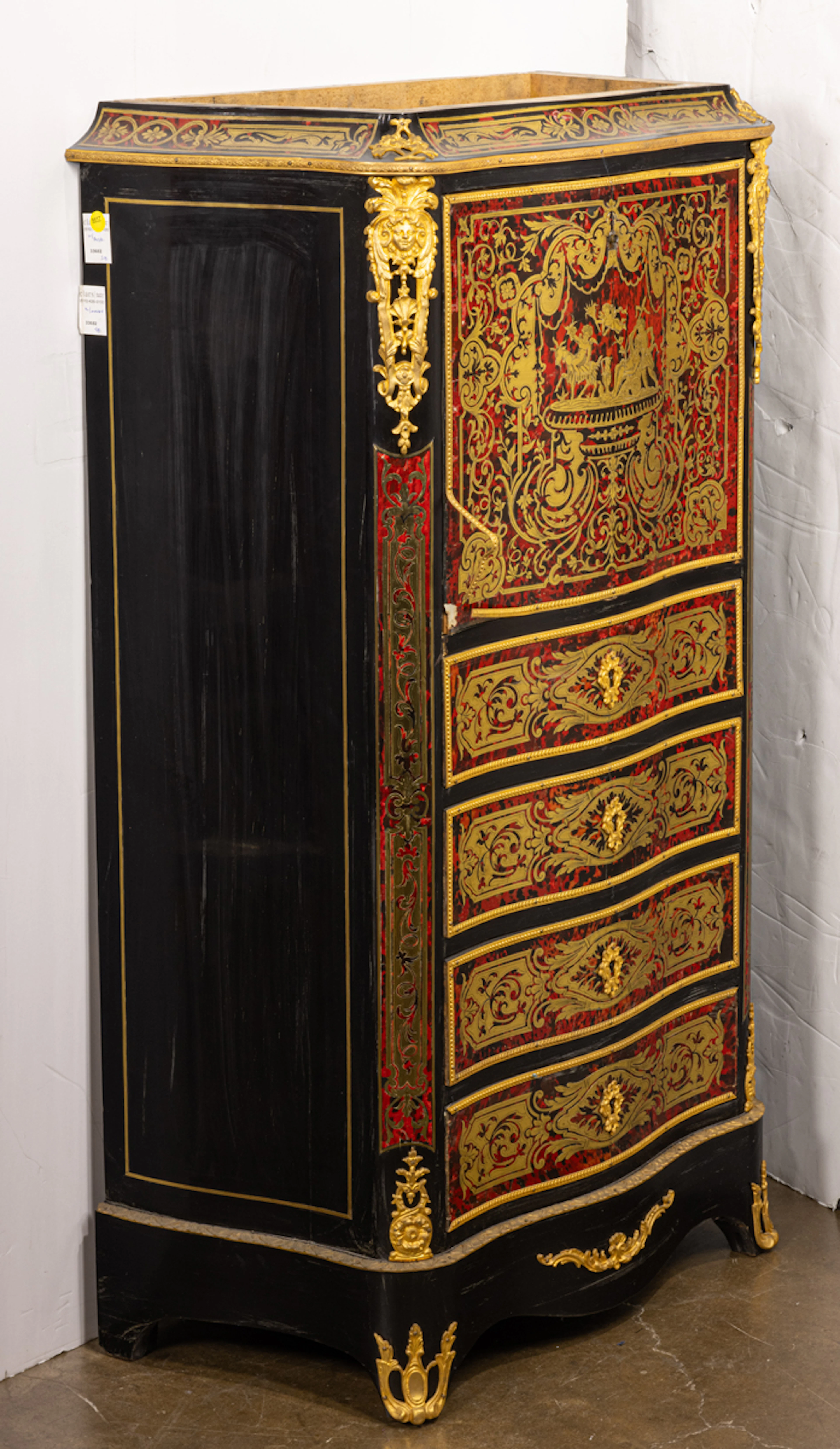 A Napoleon III gilt bronze mounted and boule marquetry inlaid secretaire