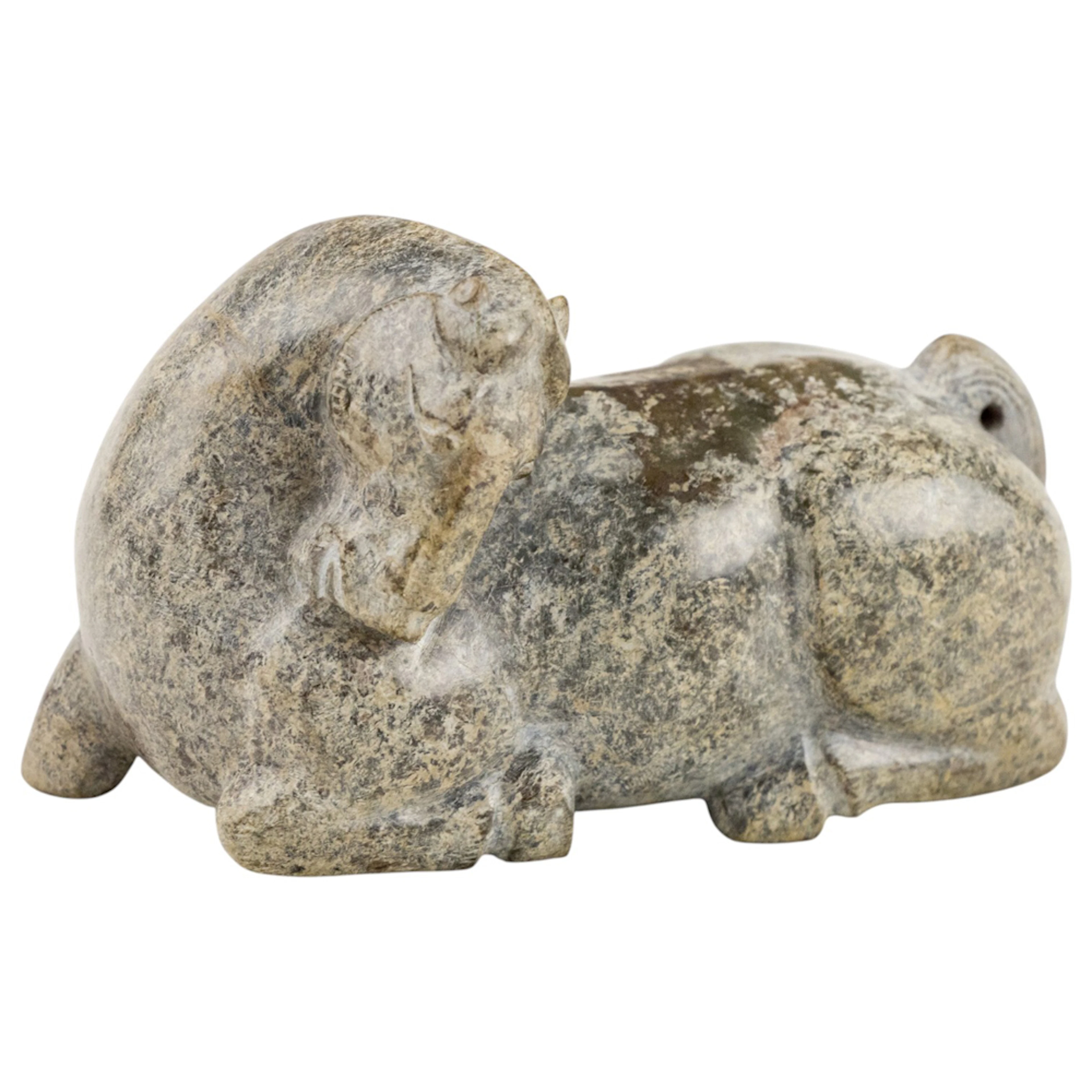 A Chinese jade carving of a recumbent horse