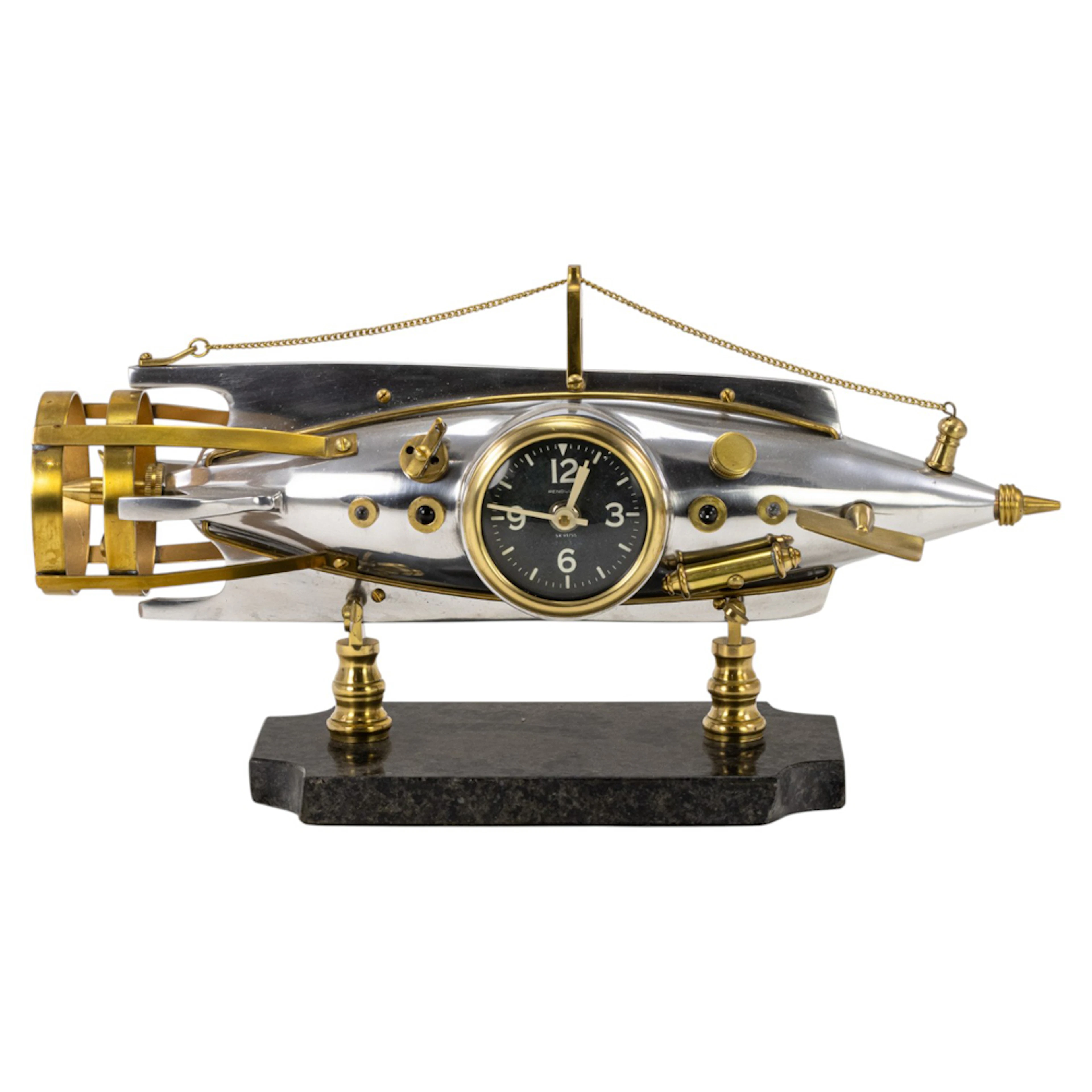 A Pendulux Nautilus aluminum and brass table clock