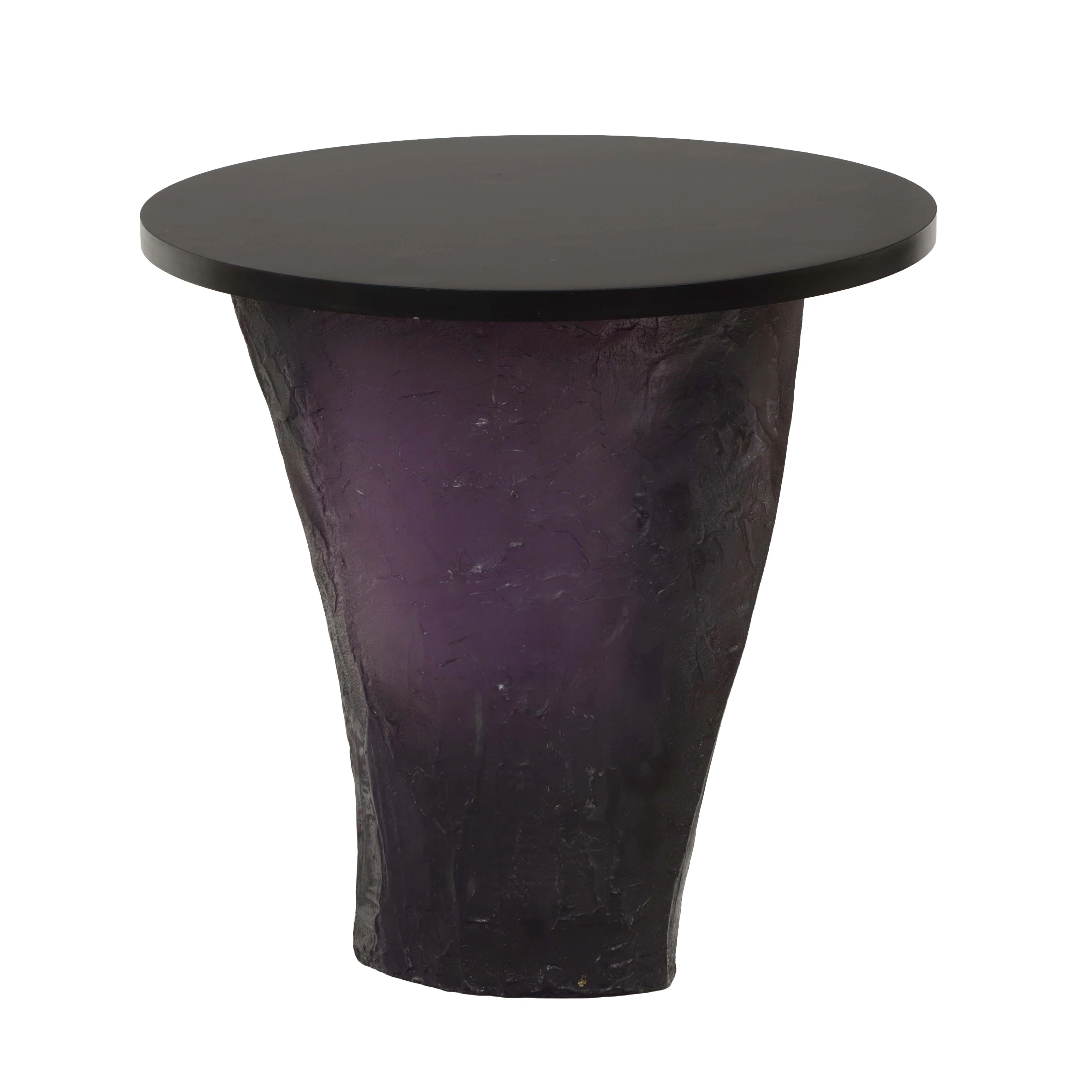 A Modernist amethyst resin and ebonized sculptural side table