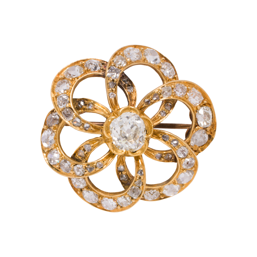 An antique diamond and 14k gold brooch