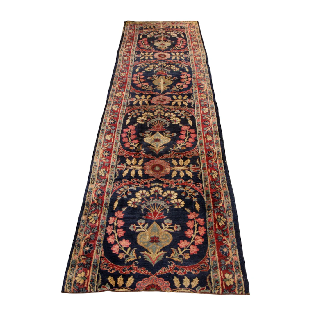 A semi antique Persian Kerman runner