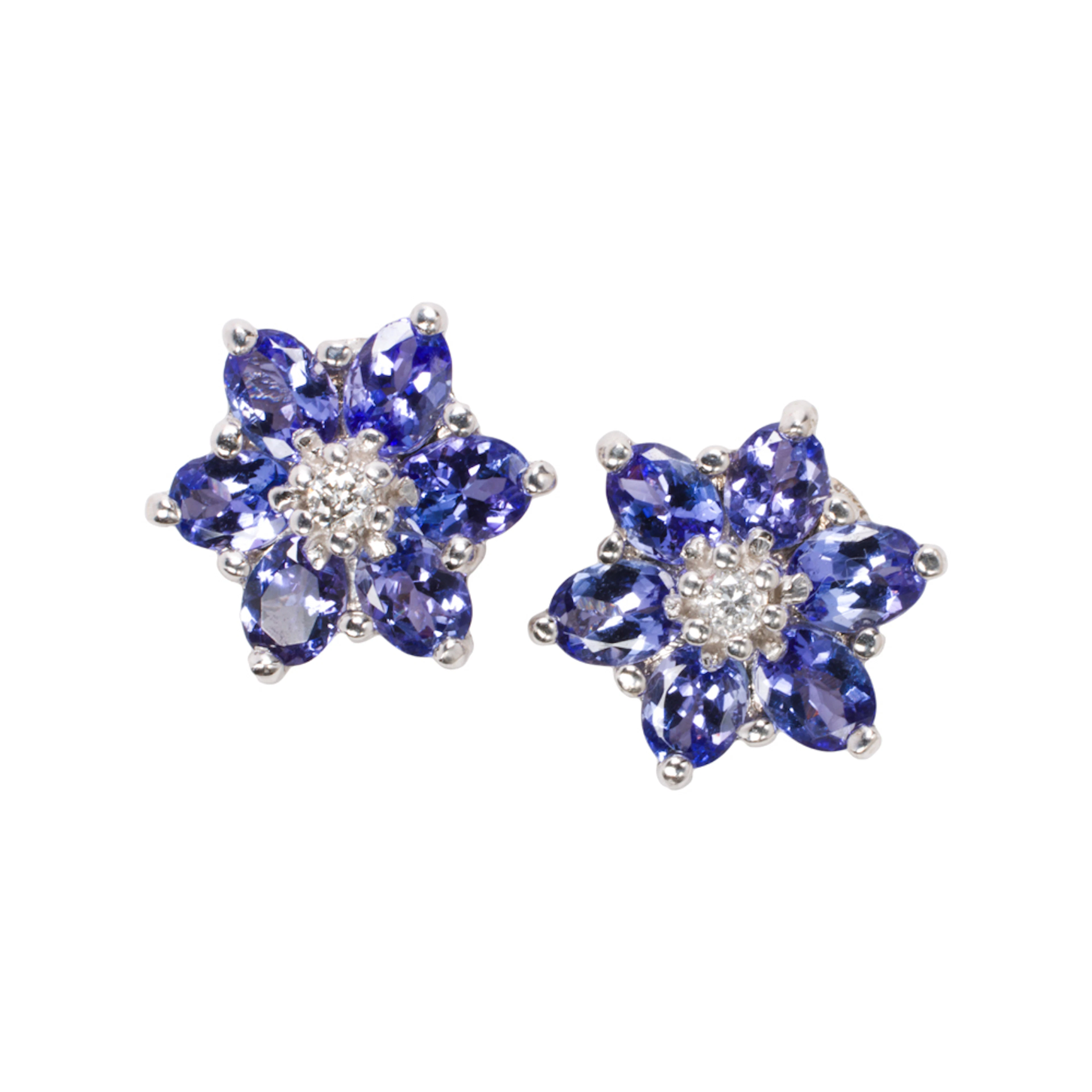 A pair tanzanite. diamond and 14k gold earrings