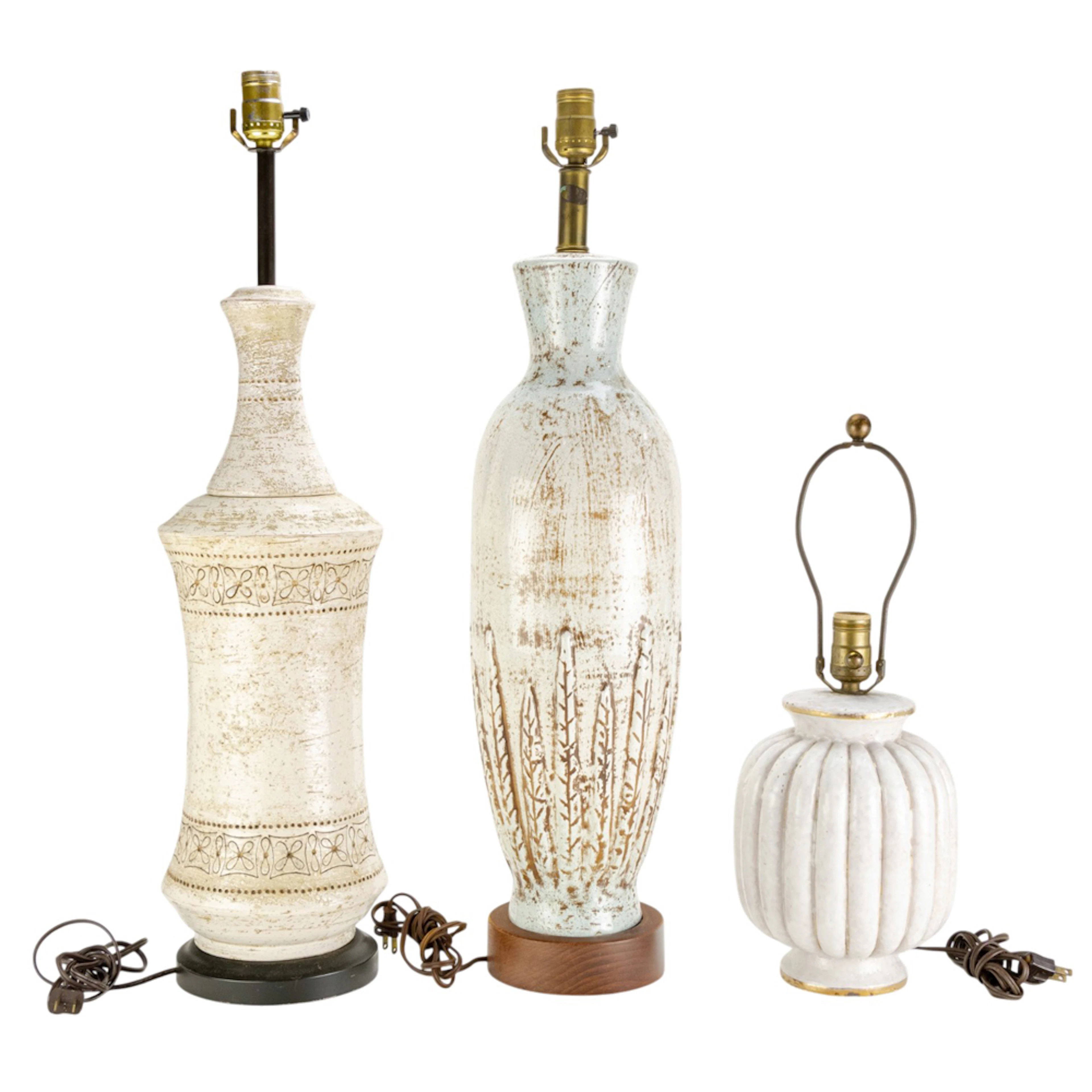 Three Italian white glazed pottery table lamps