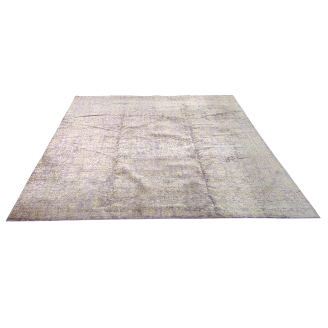 A contemporary silk Indian carpet