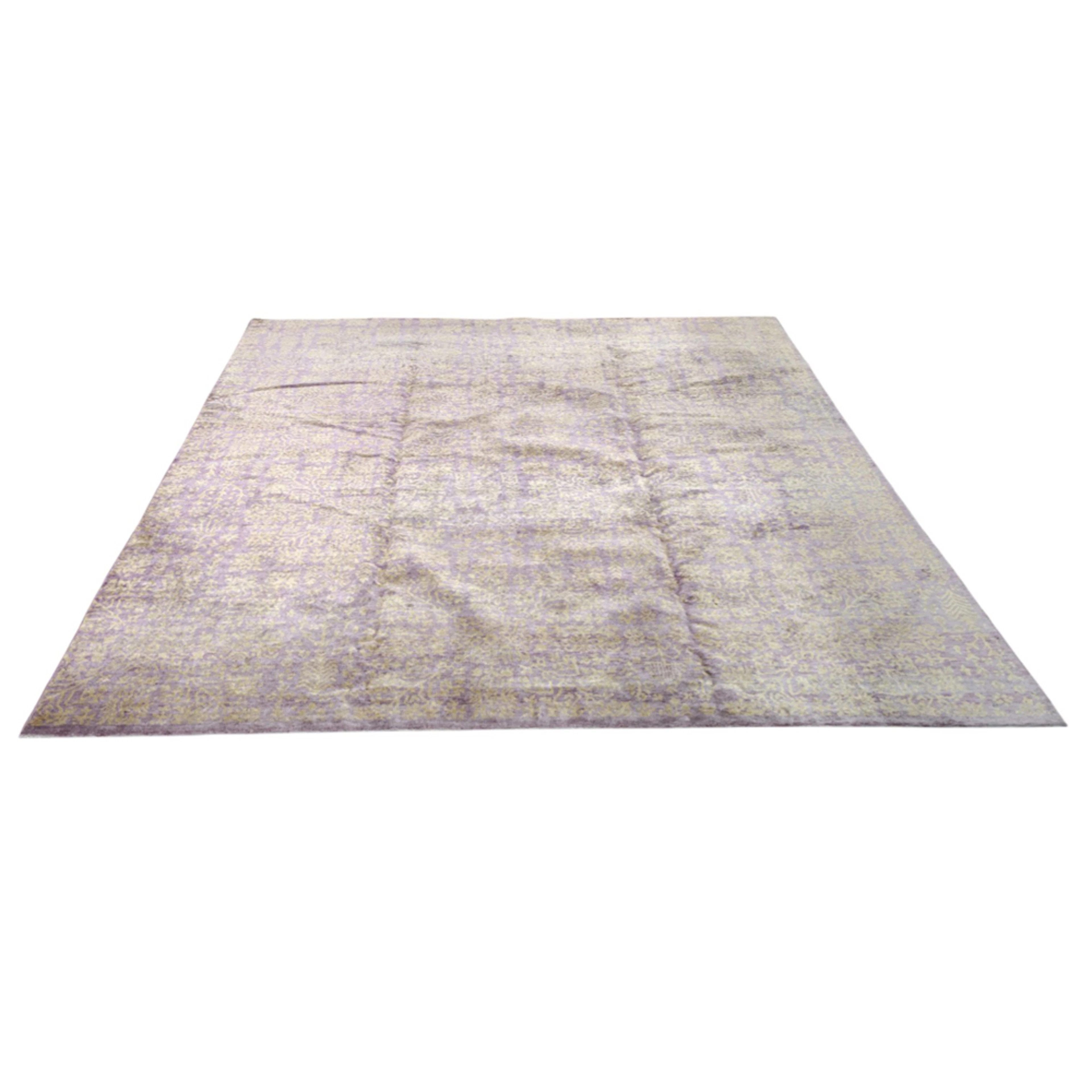 A contemporary silk Indian carpet