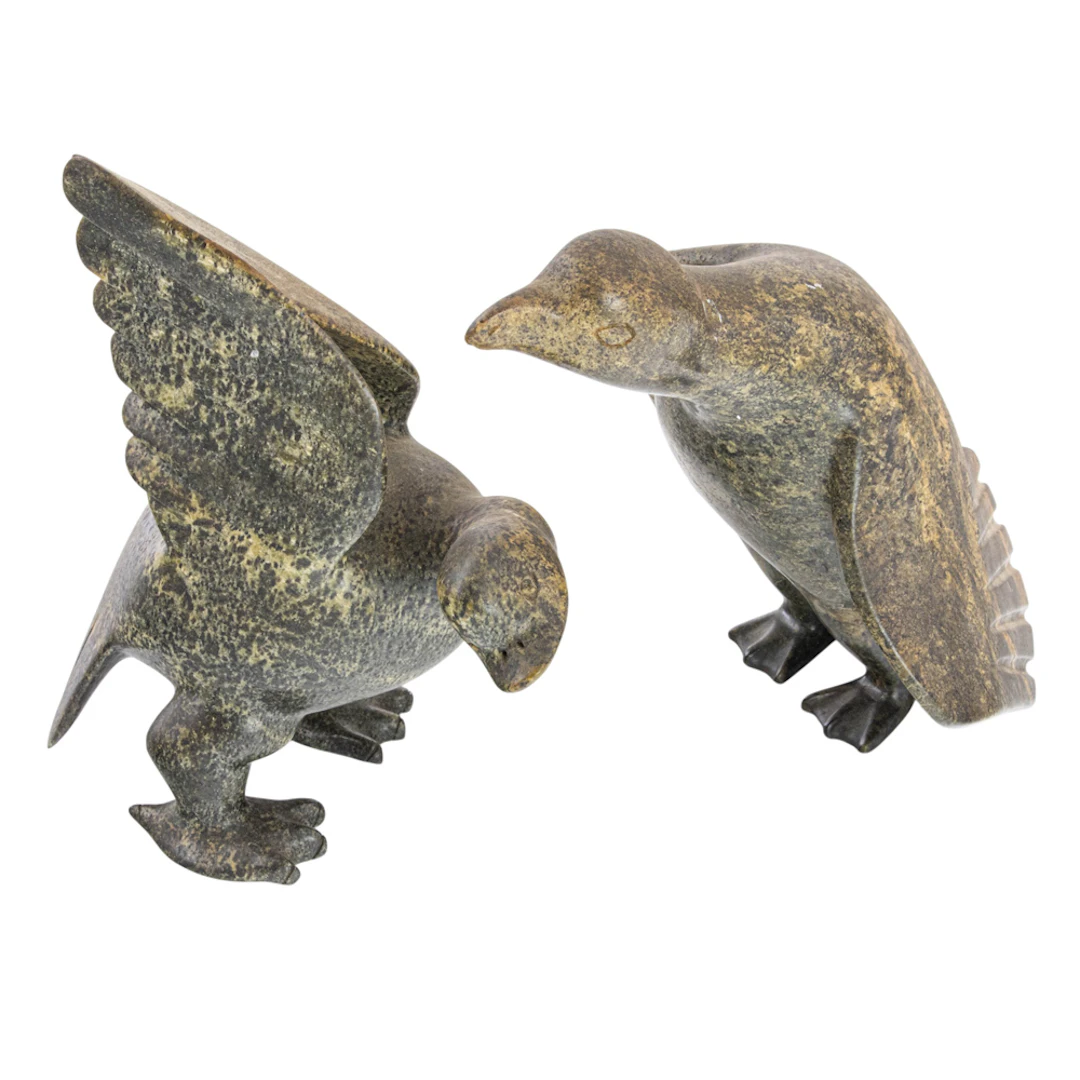 Two Inuit carved mottled serpentine stone birds