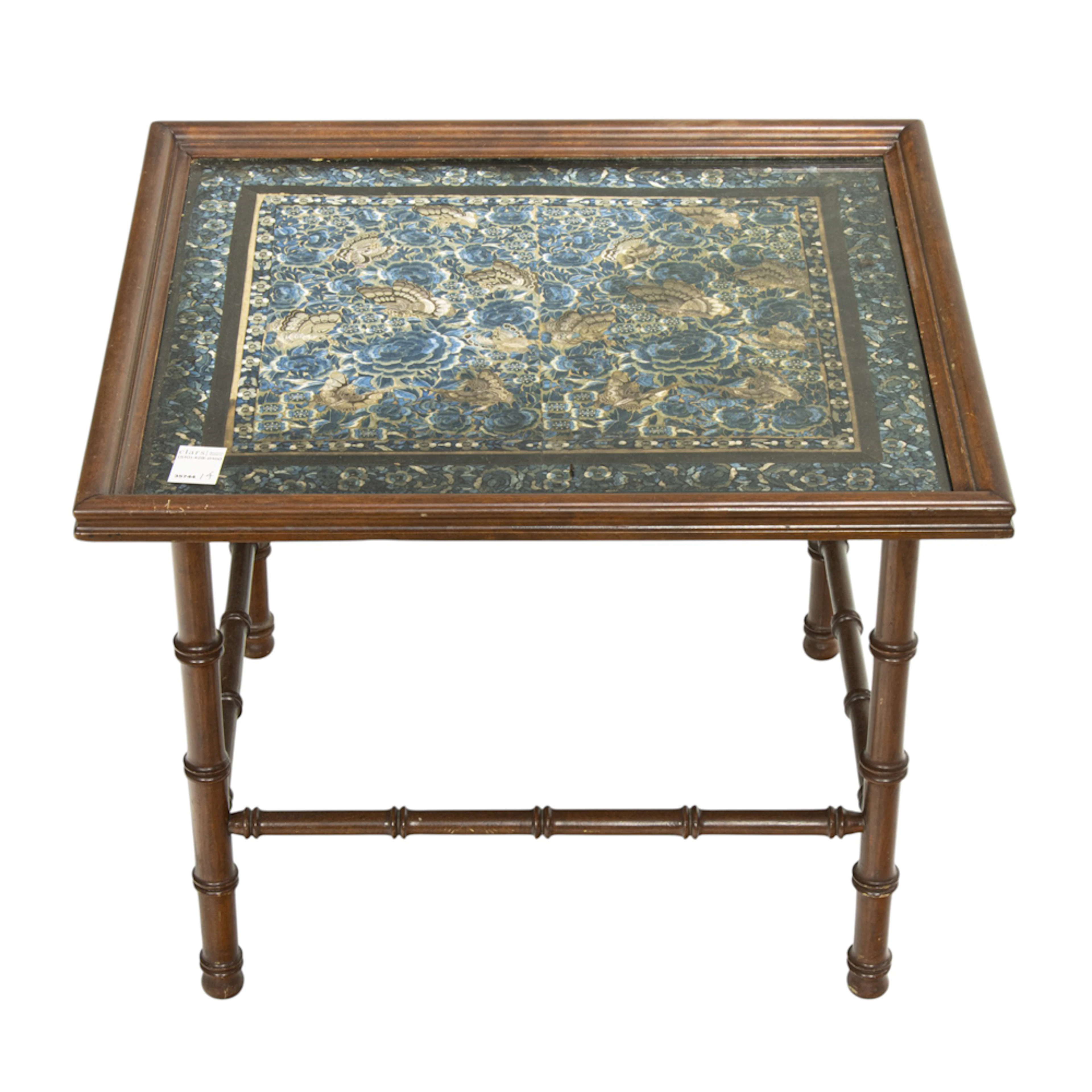 A Chinese tray table with an embroidery top
