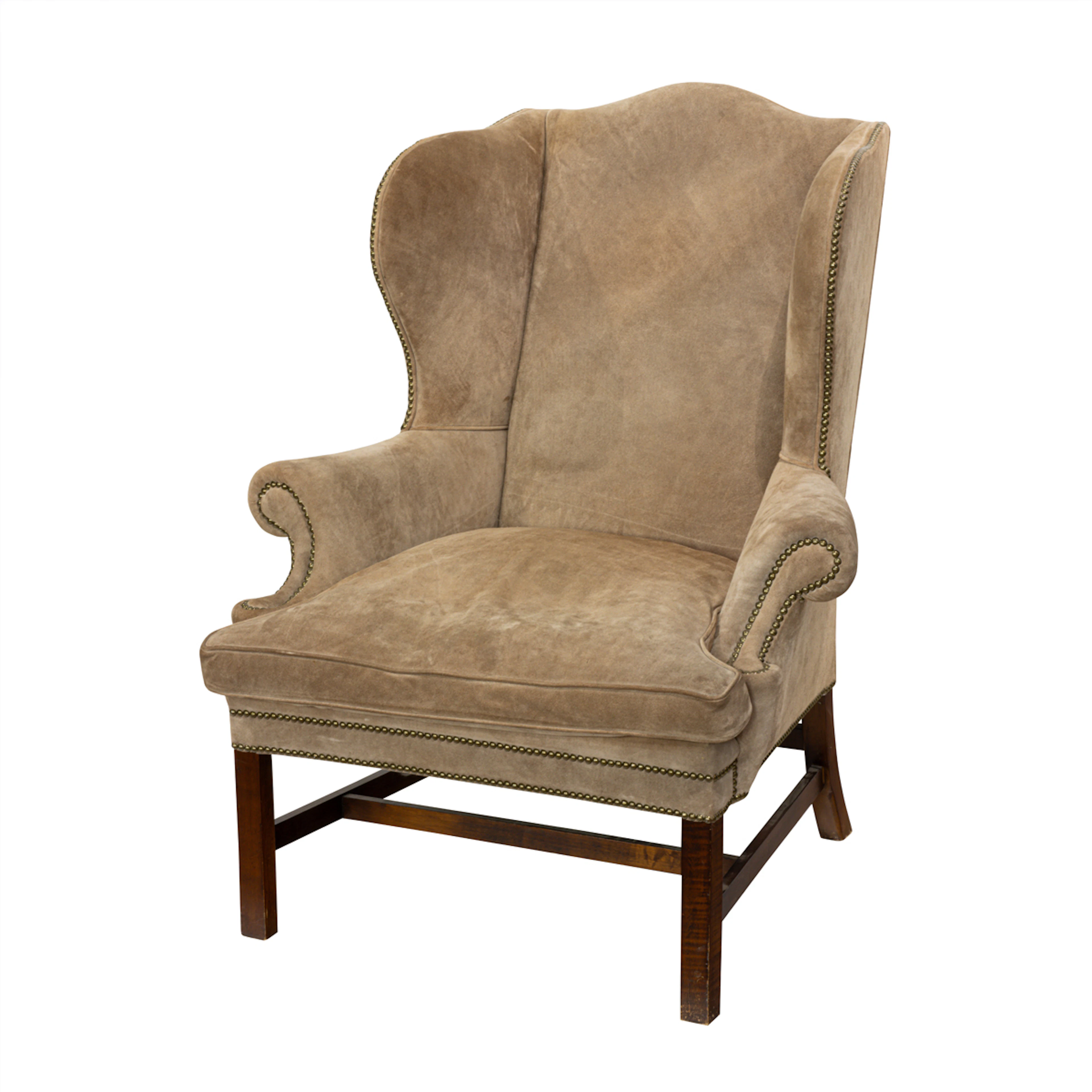 A Ralph Lauren camel suede upholstered wing back chair