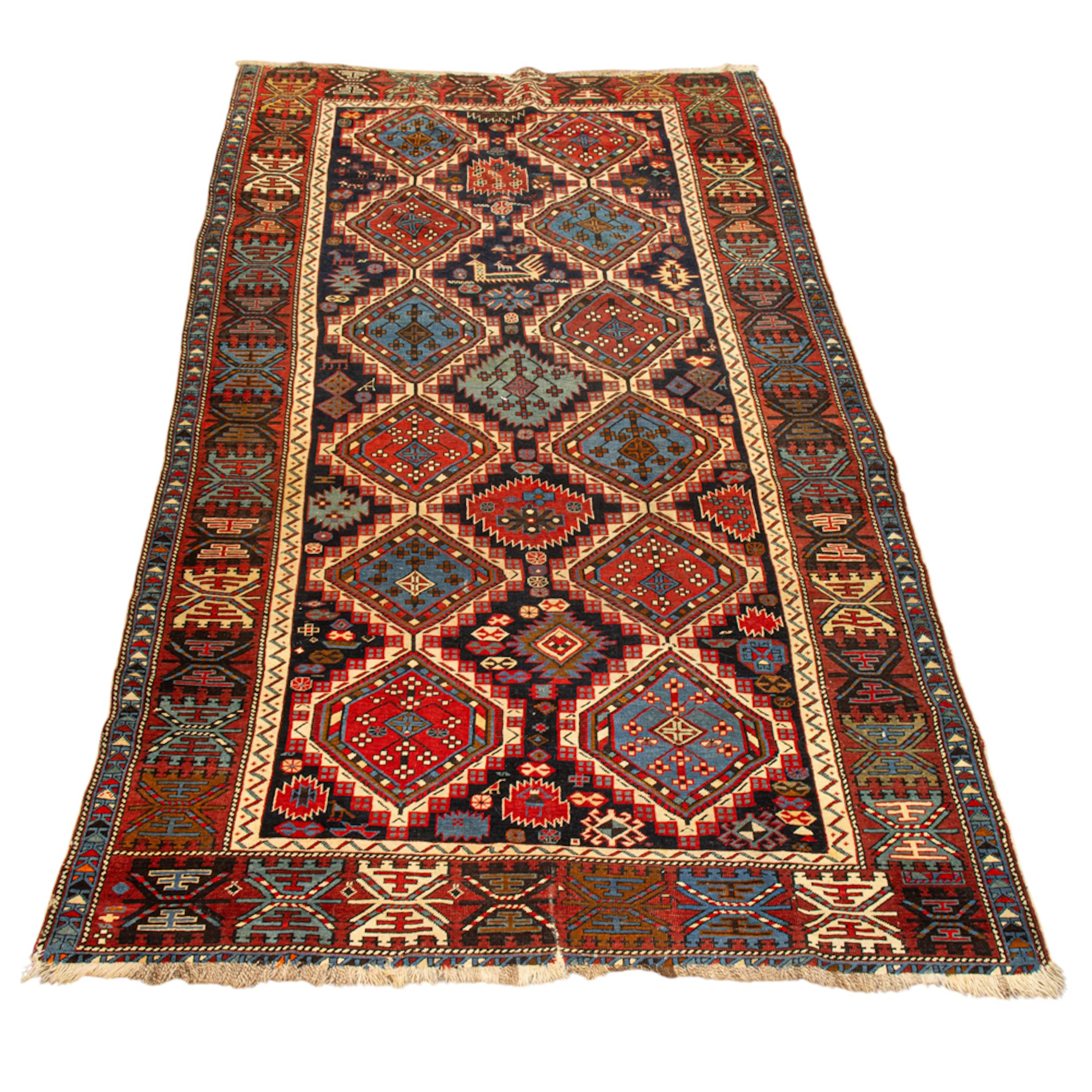 An antique Caucasian carpet