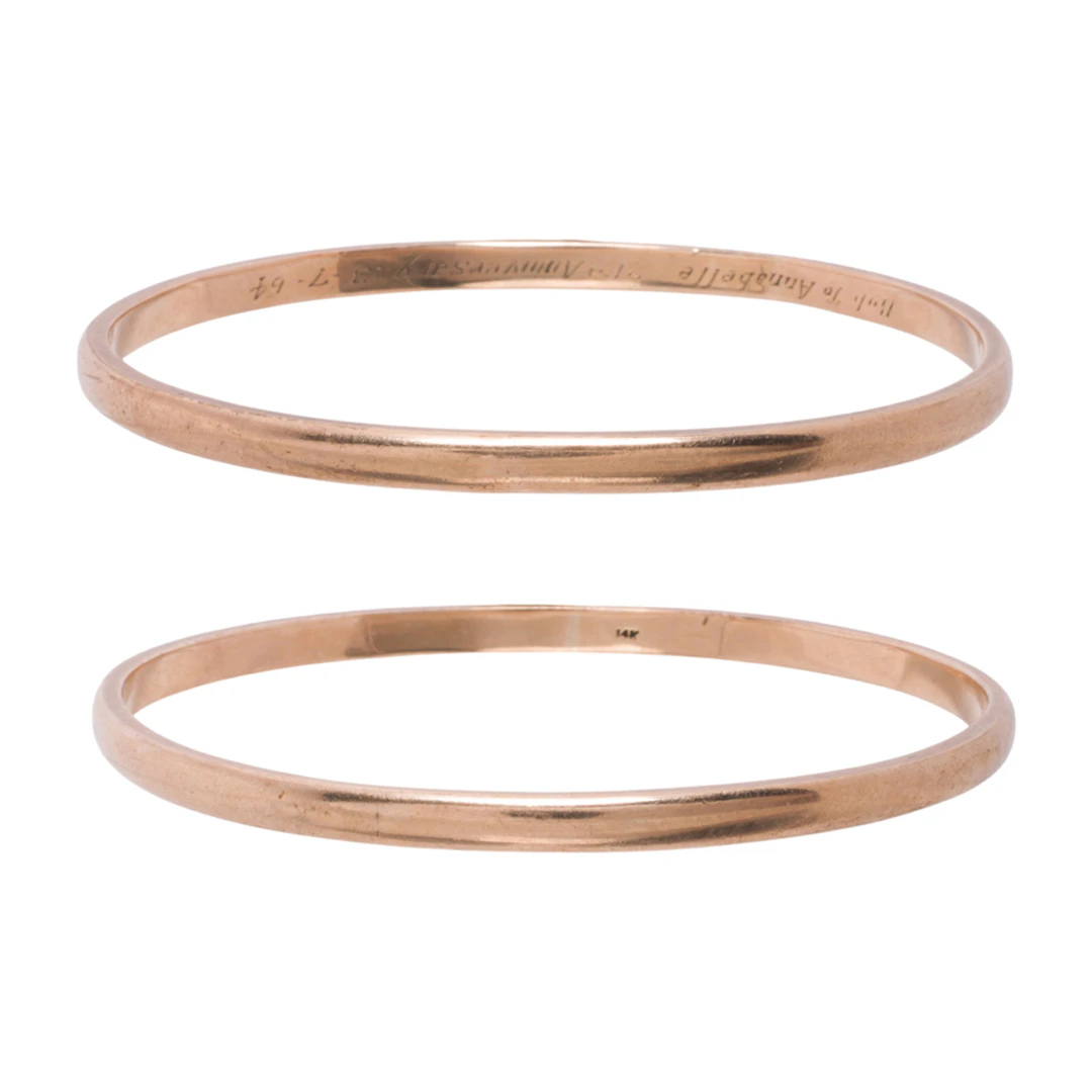A pair of 14k gold bangle bracelets