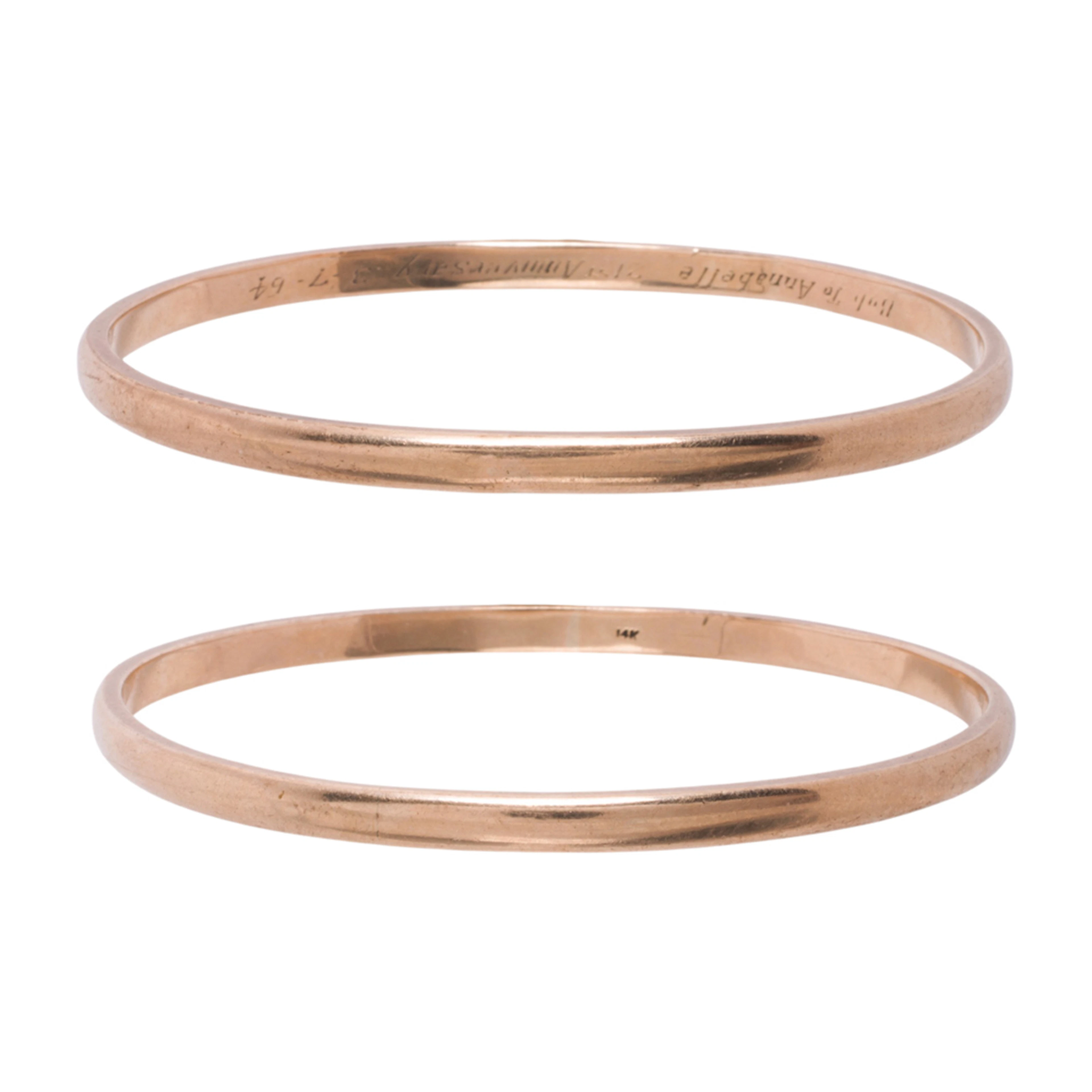 A pair of 14k gold bangle bracelets