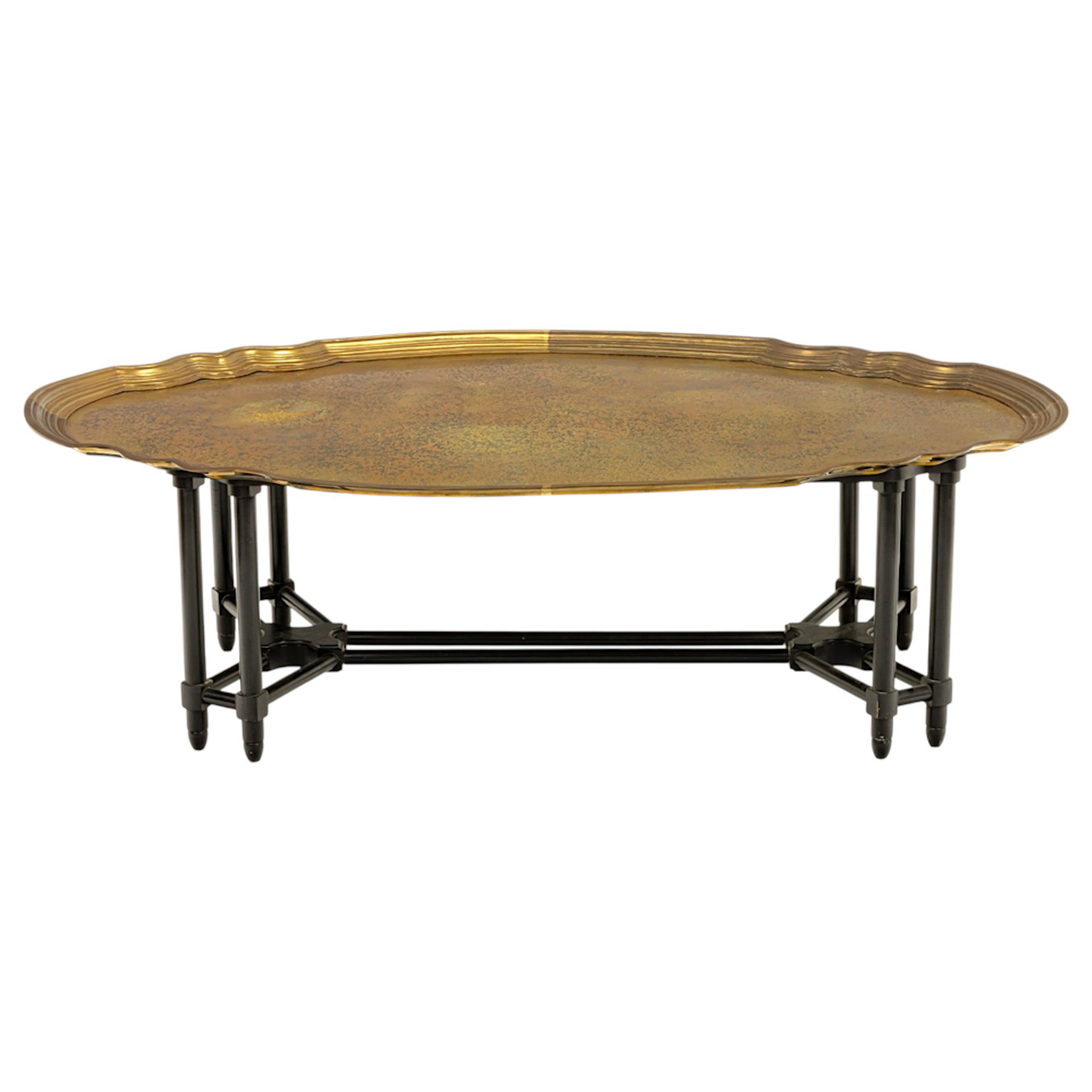 A contemporary acid etched brass tray on stand