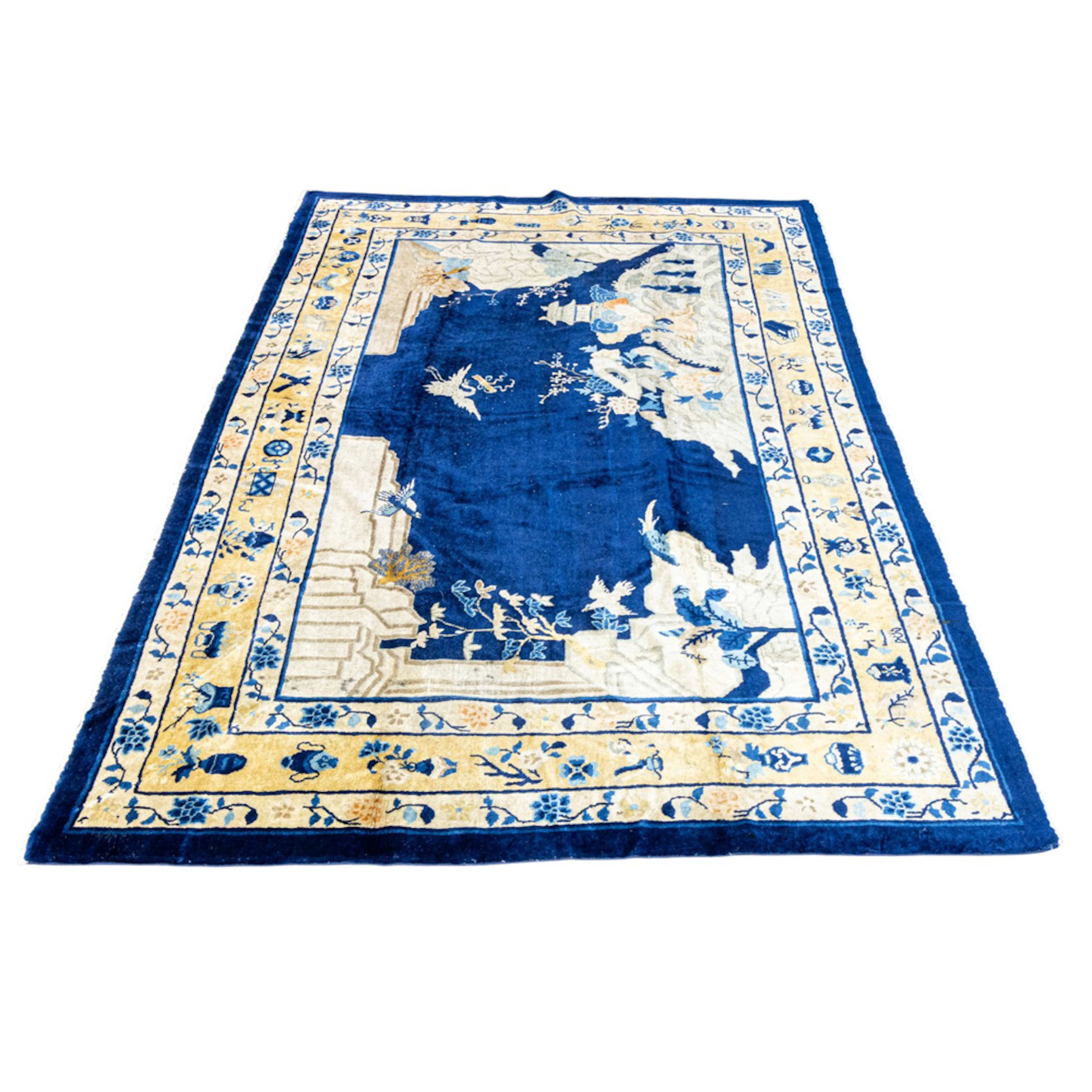 An antique Chinese scenic carpet circa 1920