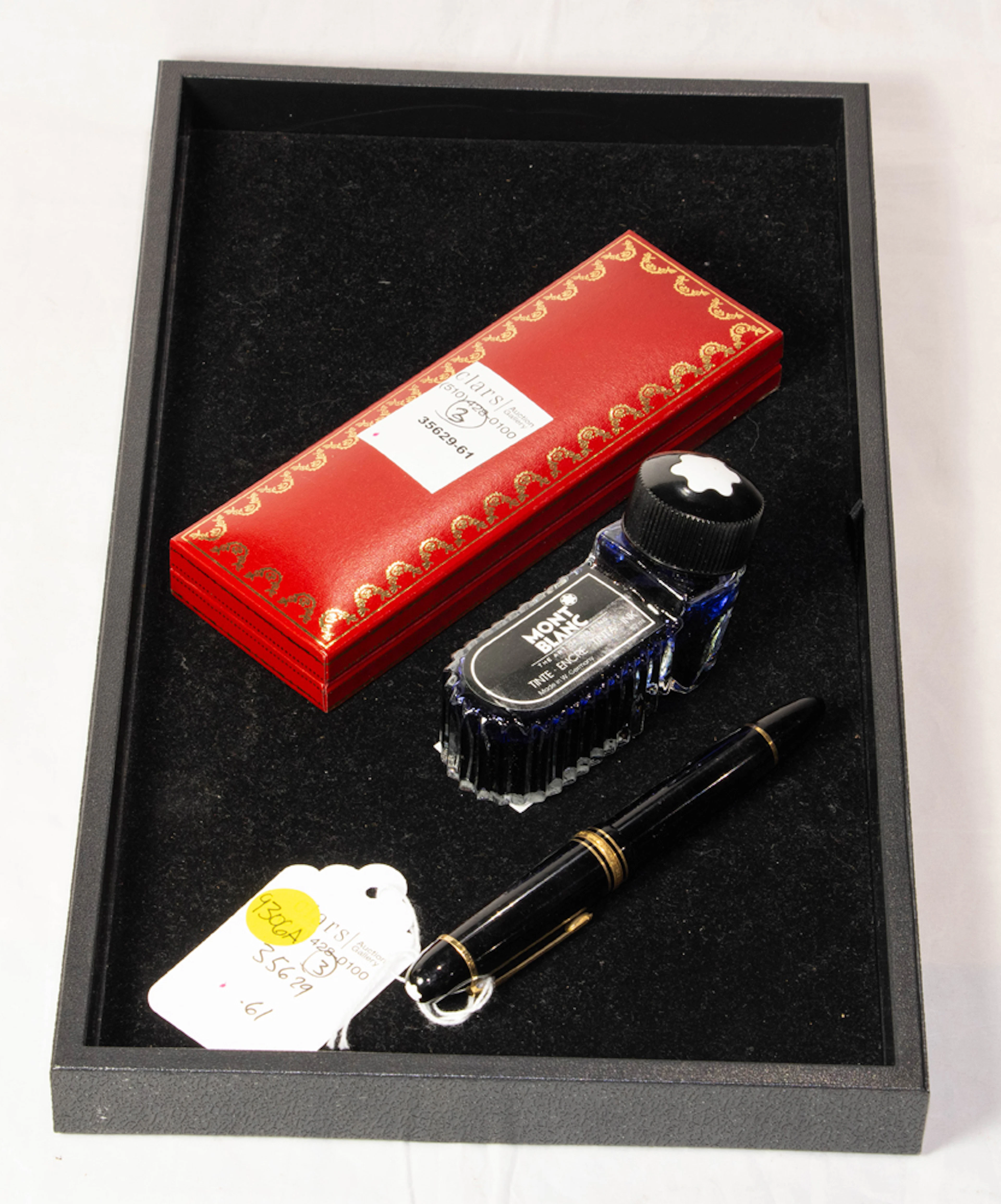 A Montblanc Meisterstuck 149 pen and Must de Cartier pen in original box