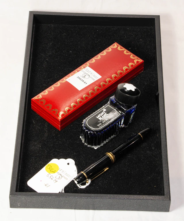A Montblanc Meisterstuck 149 pen and Must de Cartier pen in original box