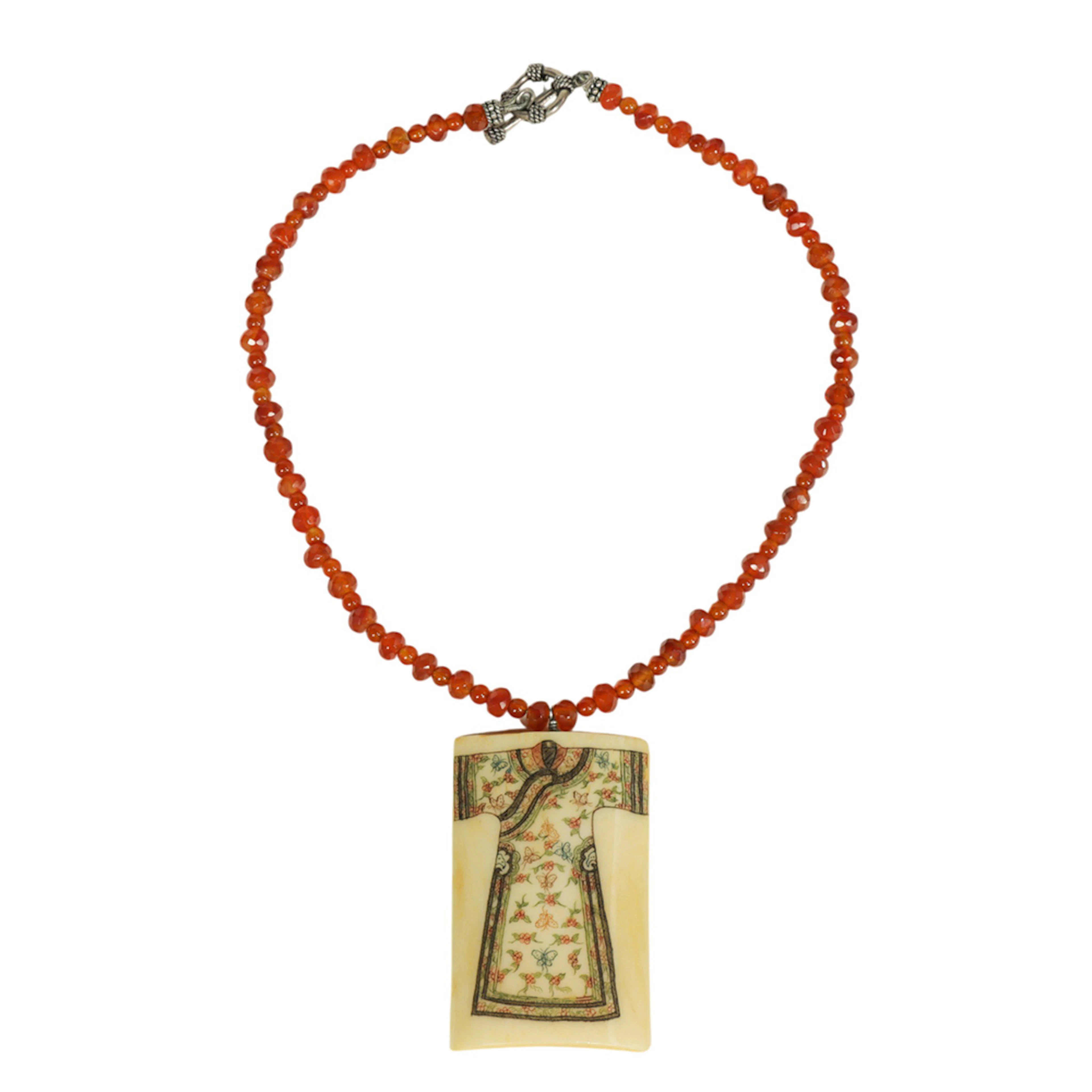 A carnelian necklace with bone pendant